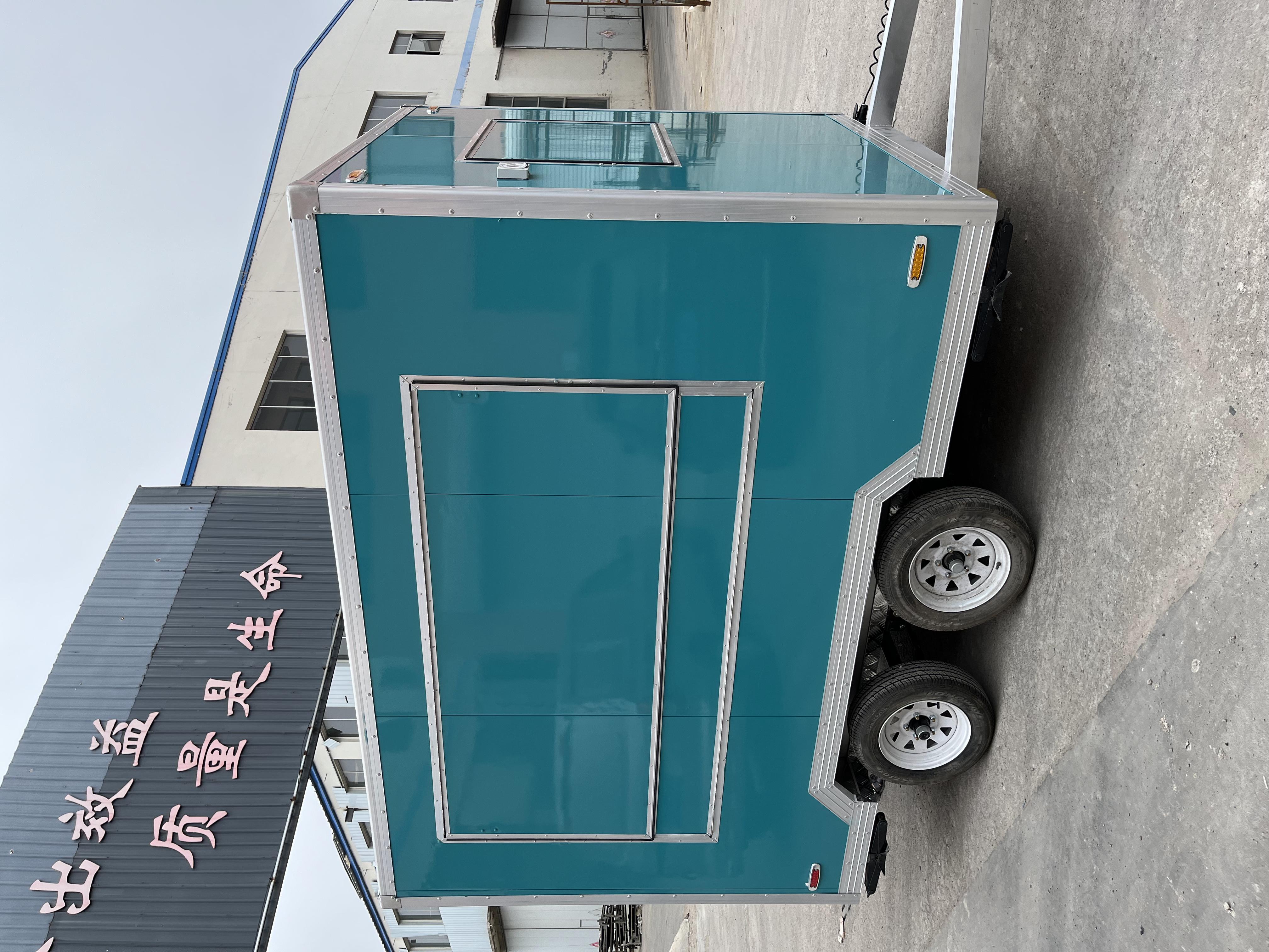 Customized blue-green mobile food truck with sunshade window, a great helper for mobile business operations