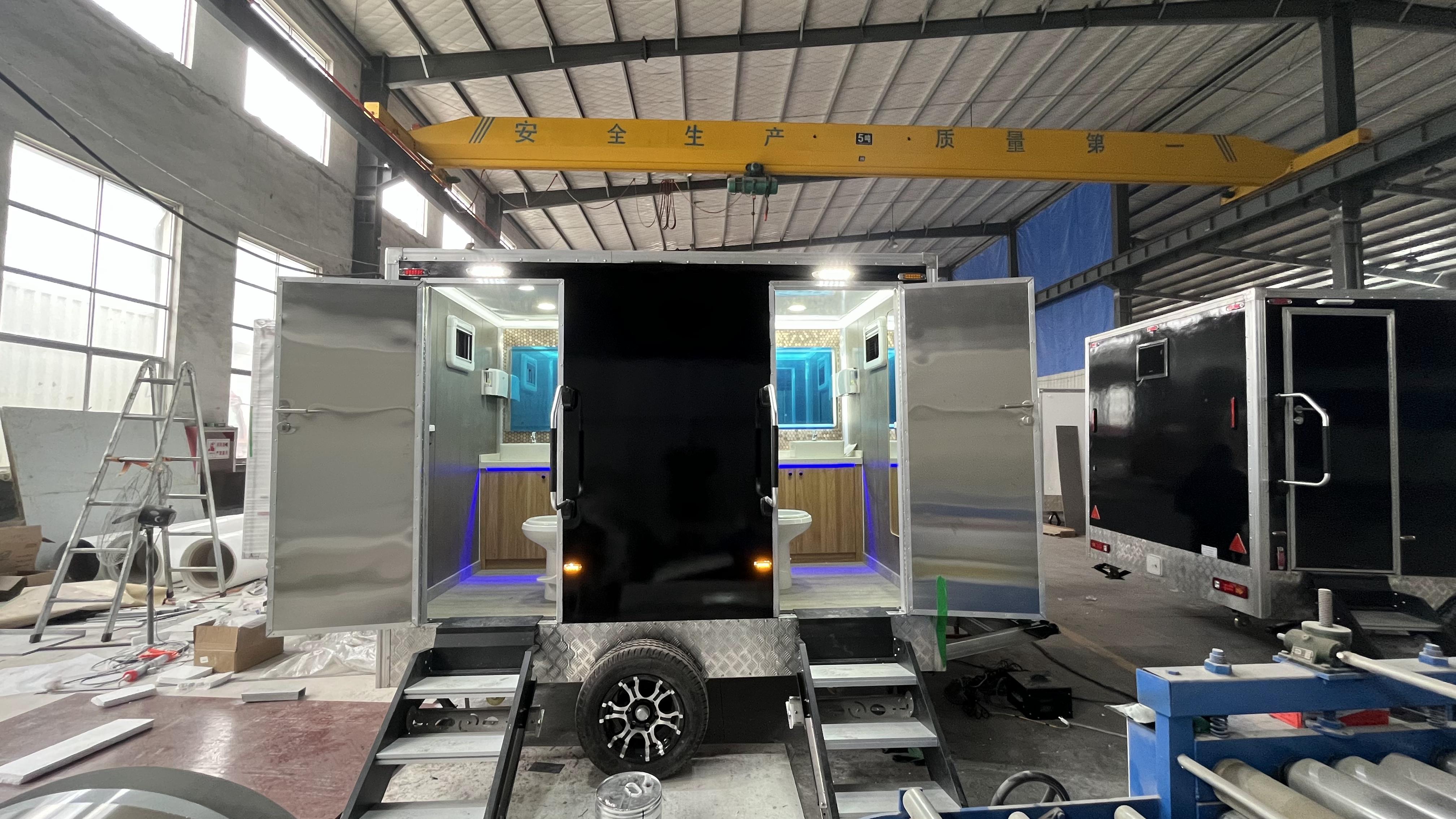 Black double/triple outdoor mobile toilets