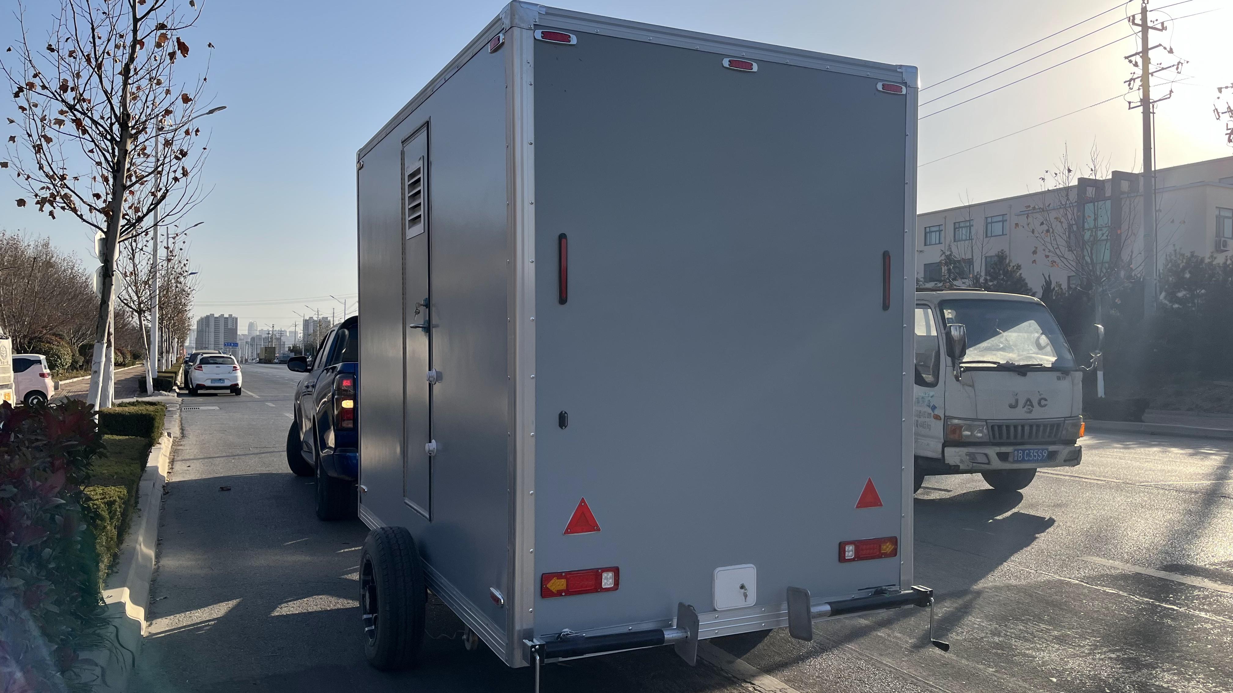 The dual-cubicle movable grey eco-friendly toilet efficiently meets temporary needs