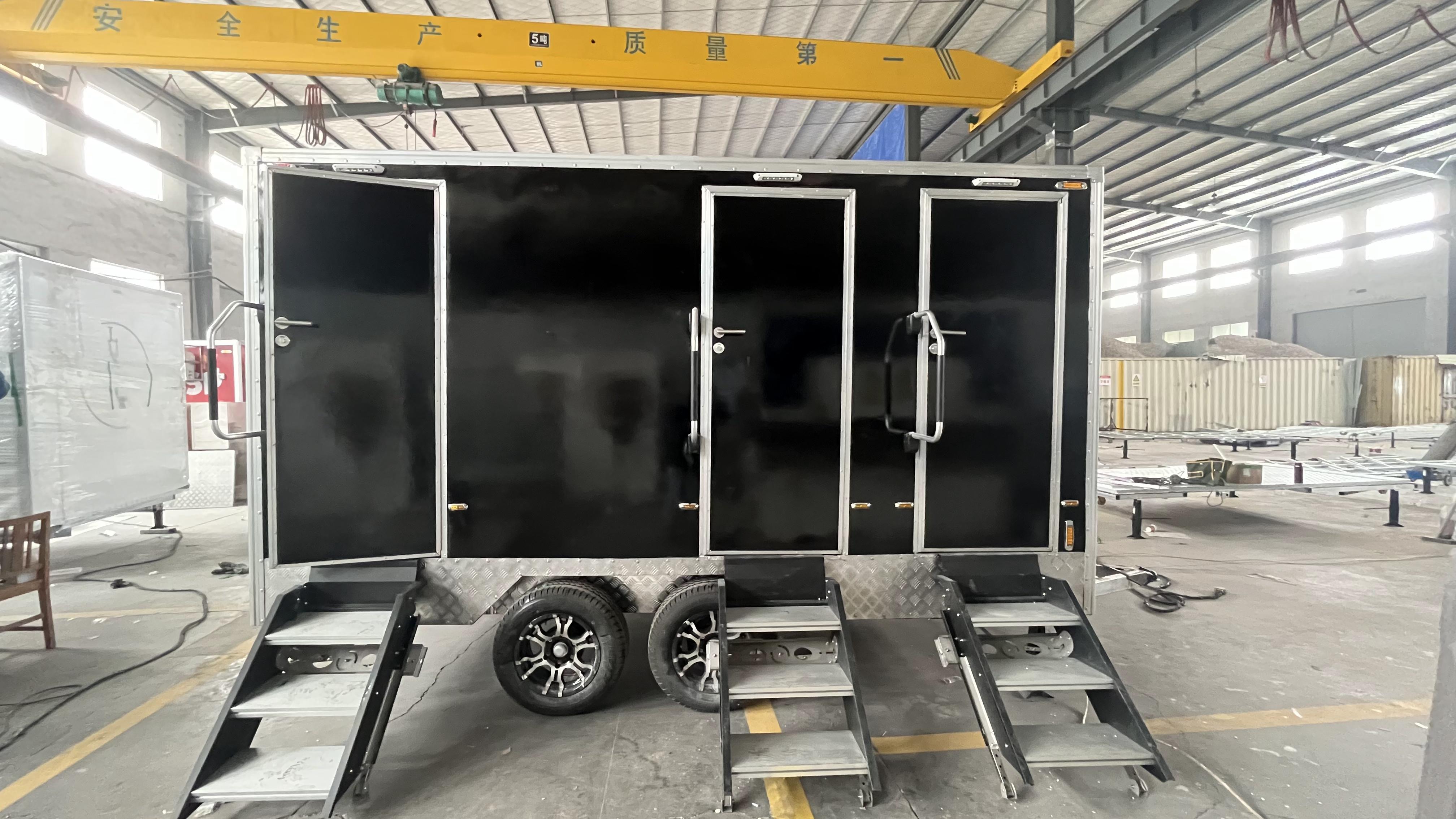 Black double/triple outdoor mobile toilets