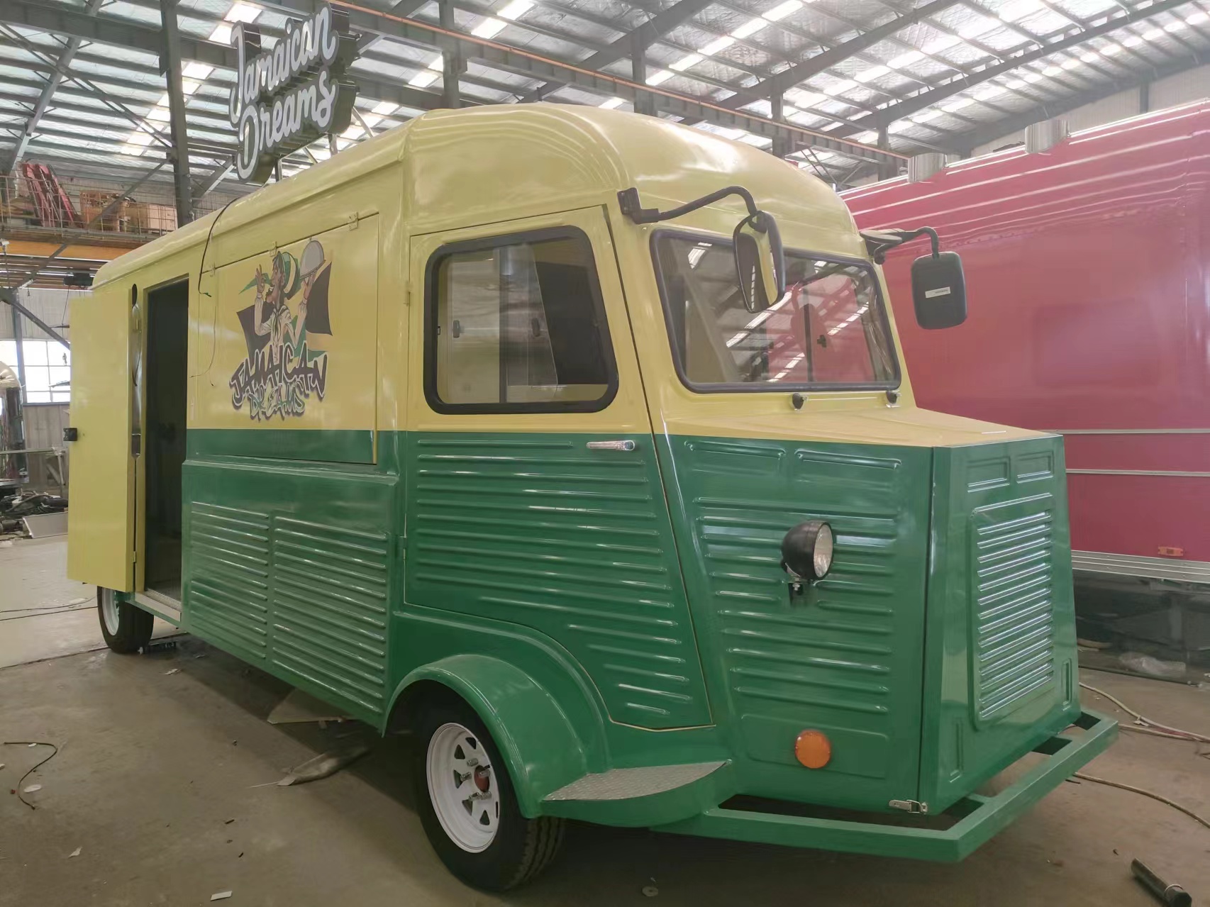 Retro-style mobile food truck, yellow and green two-color food vending vehicle