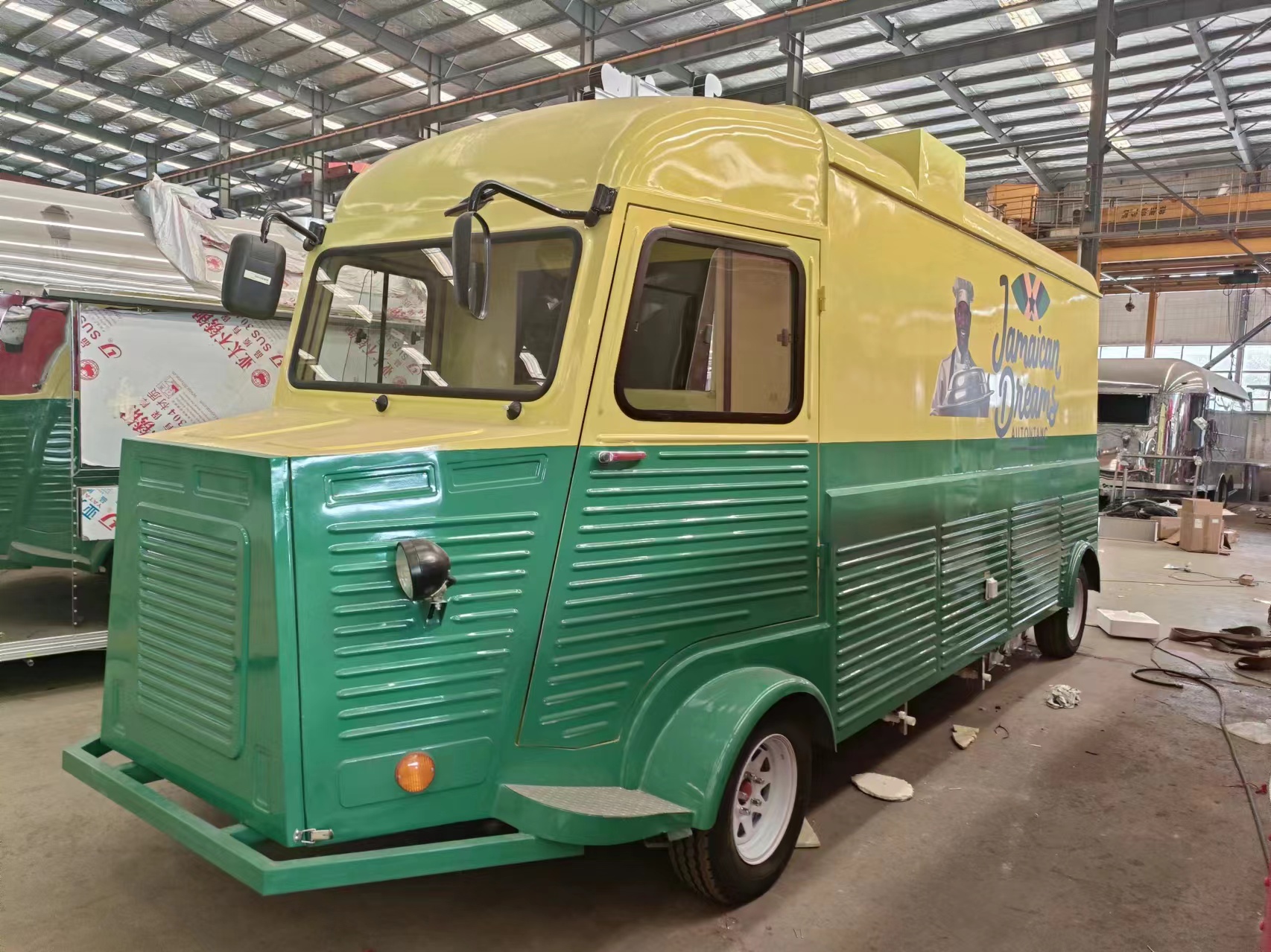 Retro-style mobile food truck, yellow and green two-color food vending vehicle