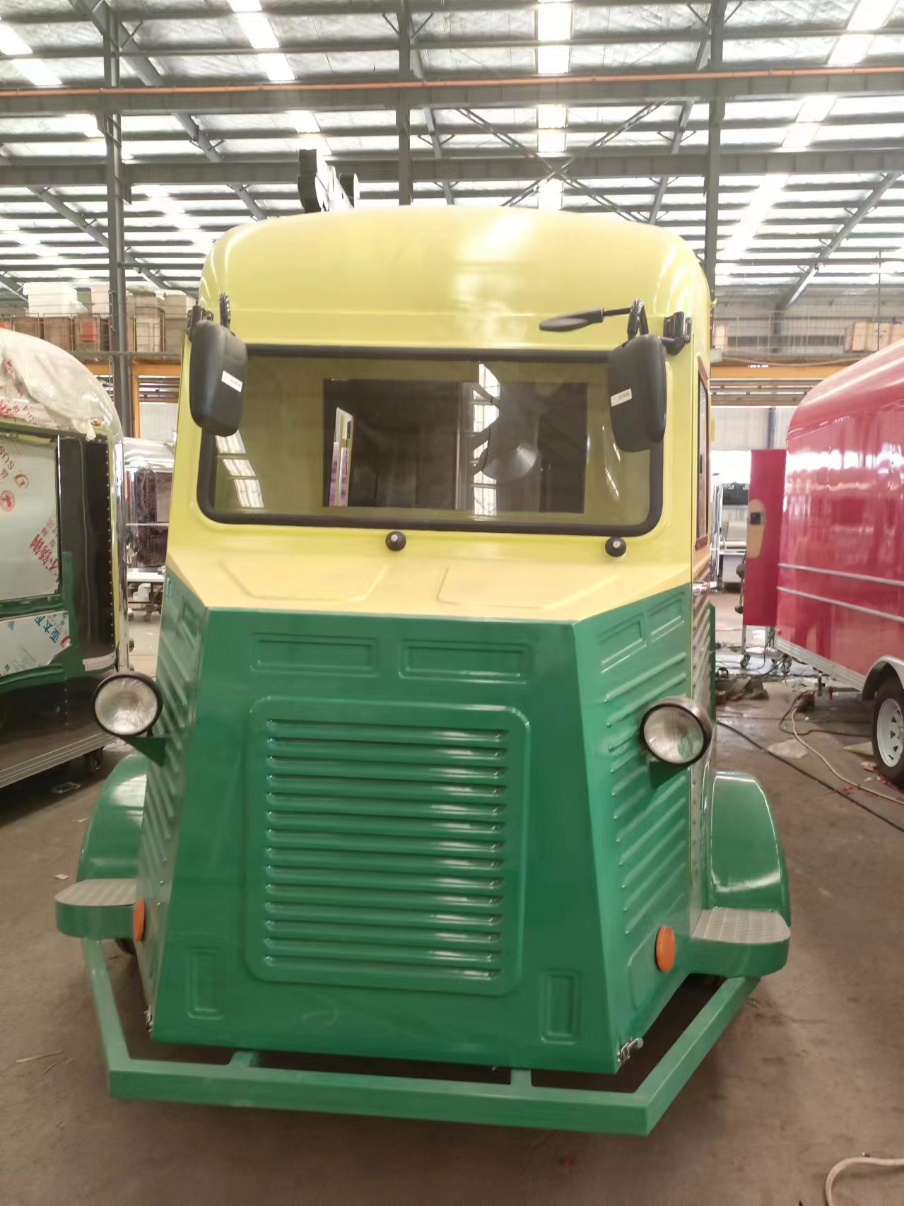 Retro-style mobile food truck, yellow and green two-color food vending vehicle