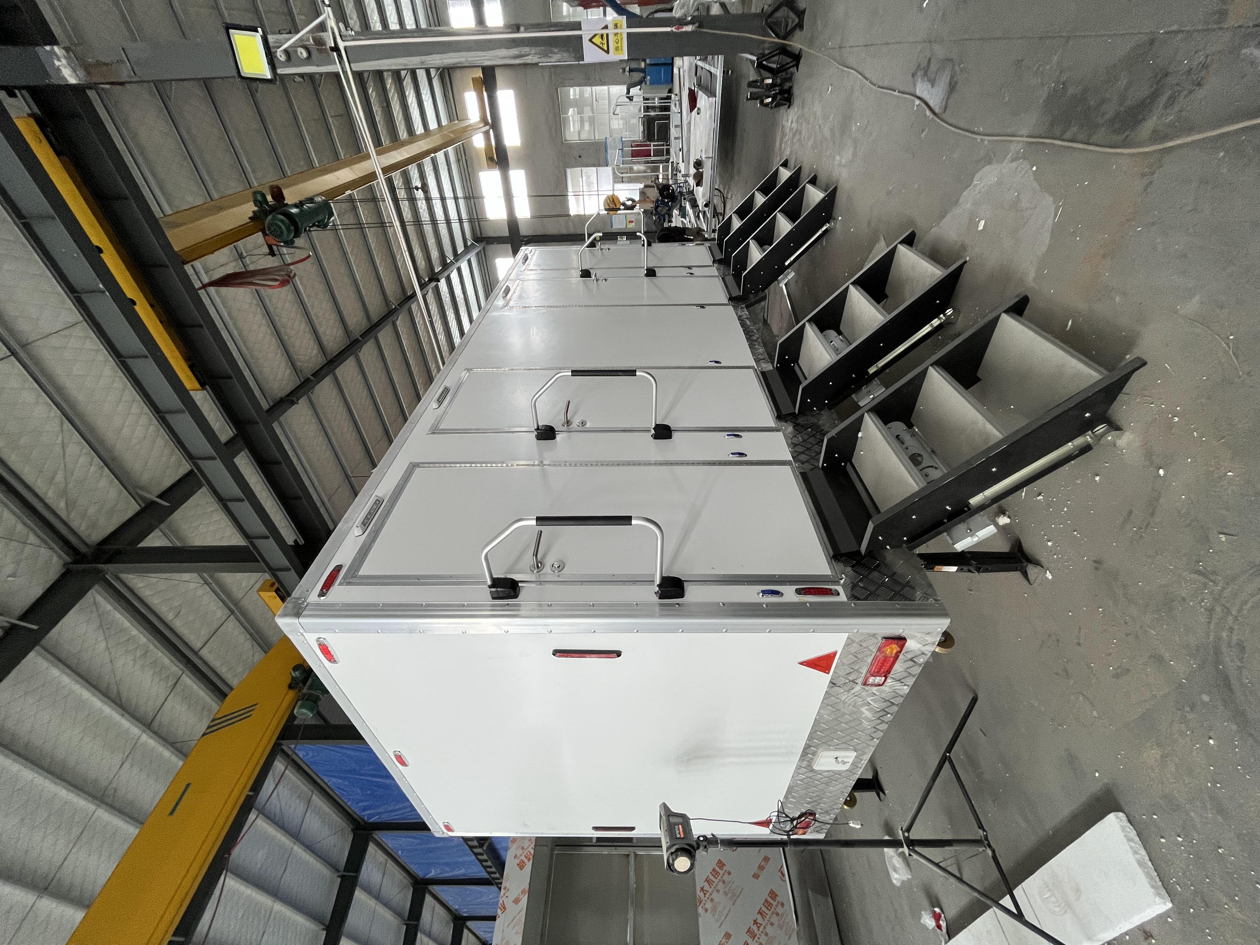 Four-room white mobile toilet