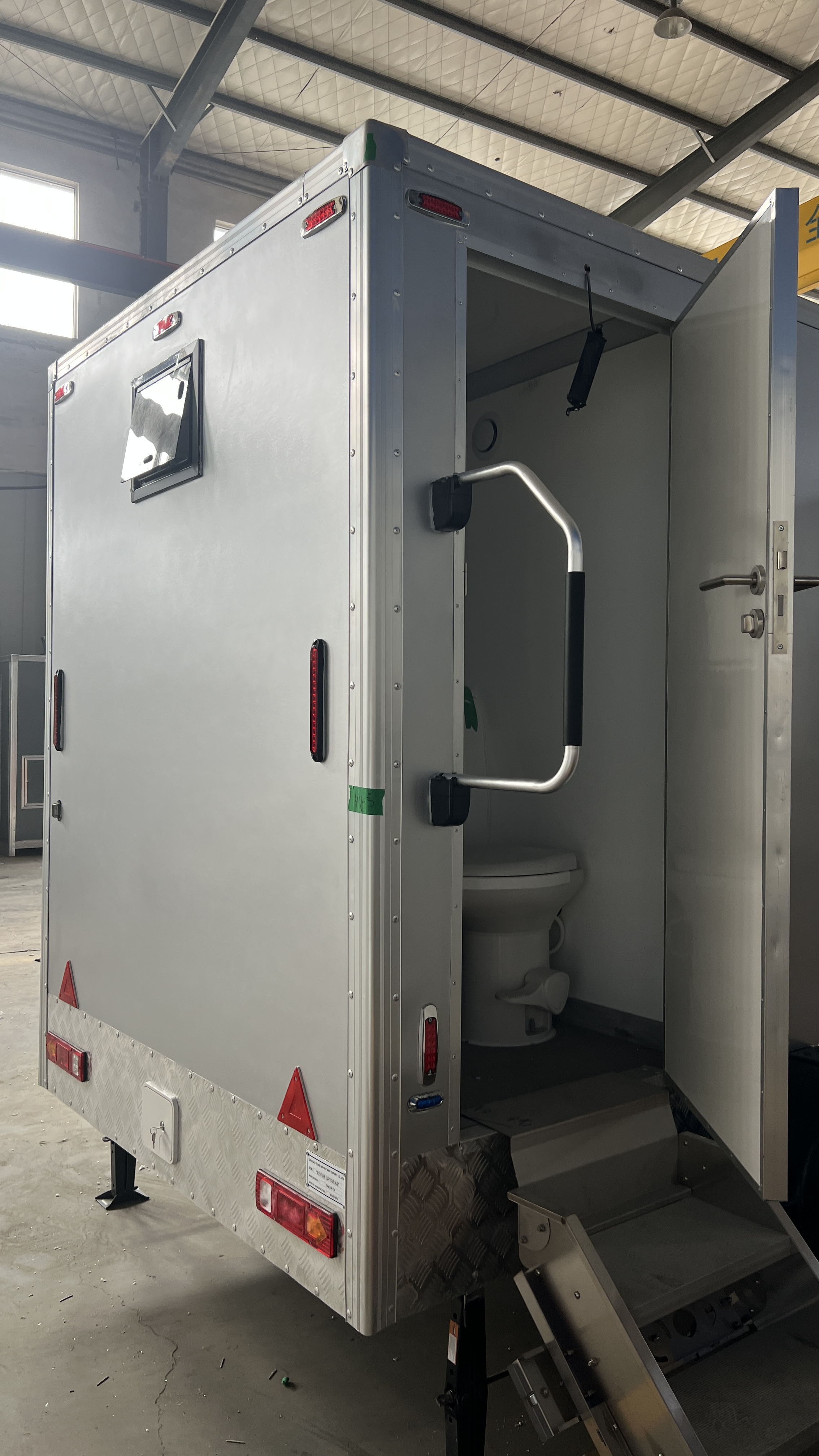 The towable double-door mobile bathroom is made of industrial-grade materials and is practical for flexible deployment