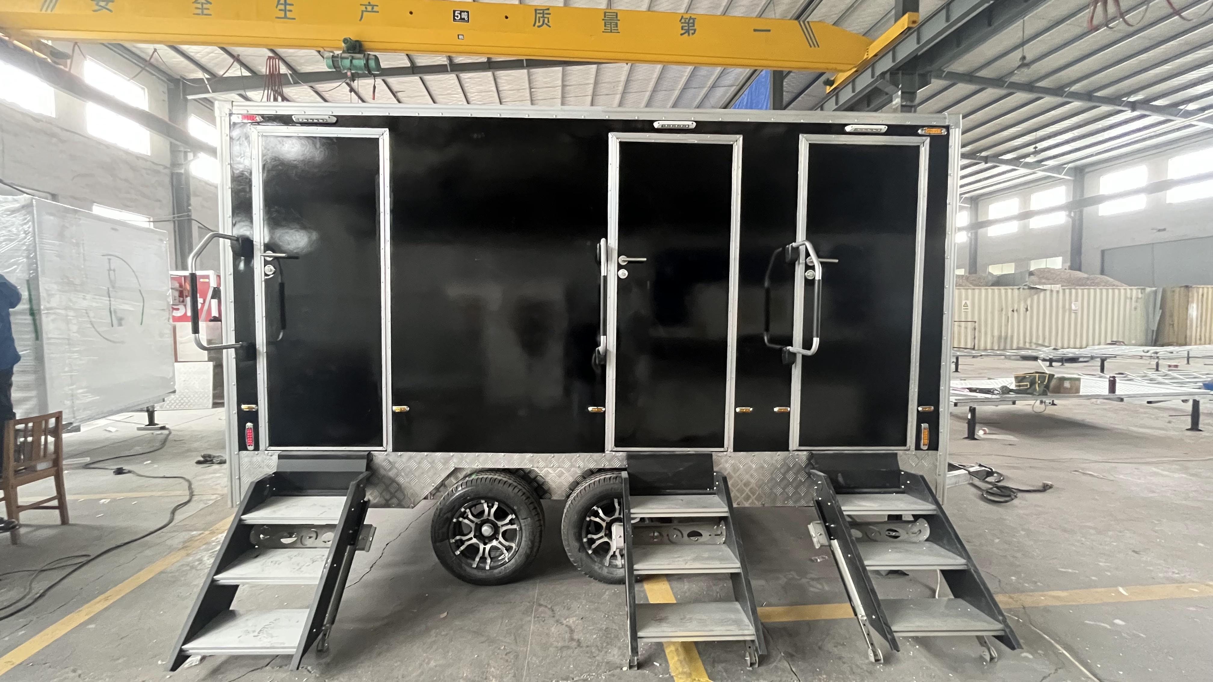 Black double/triple outdoor mobile toilets