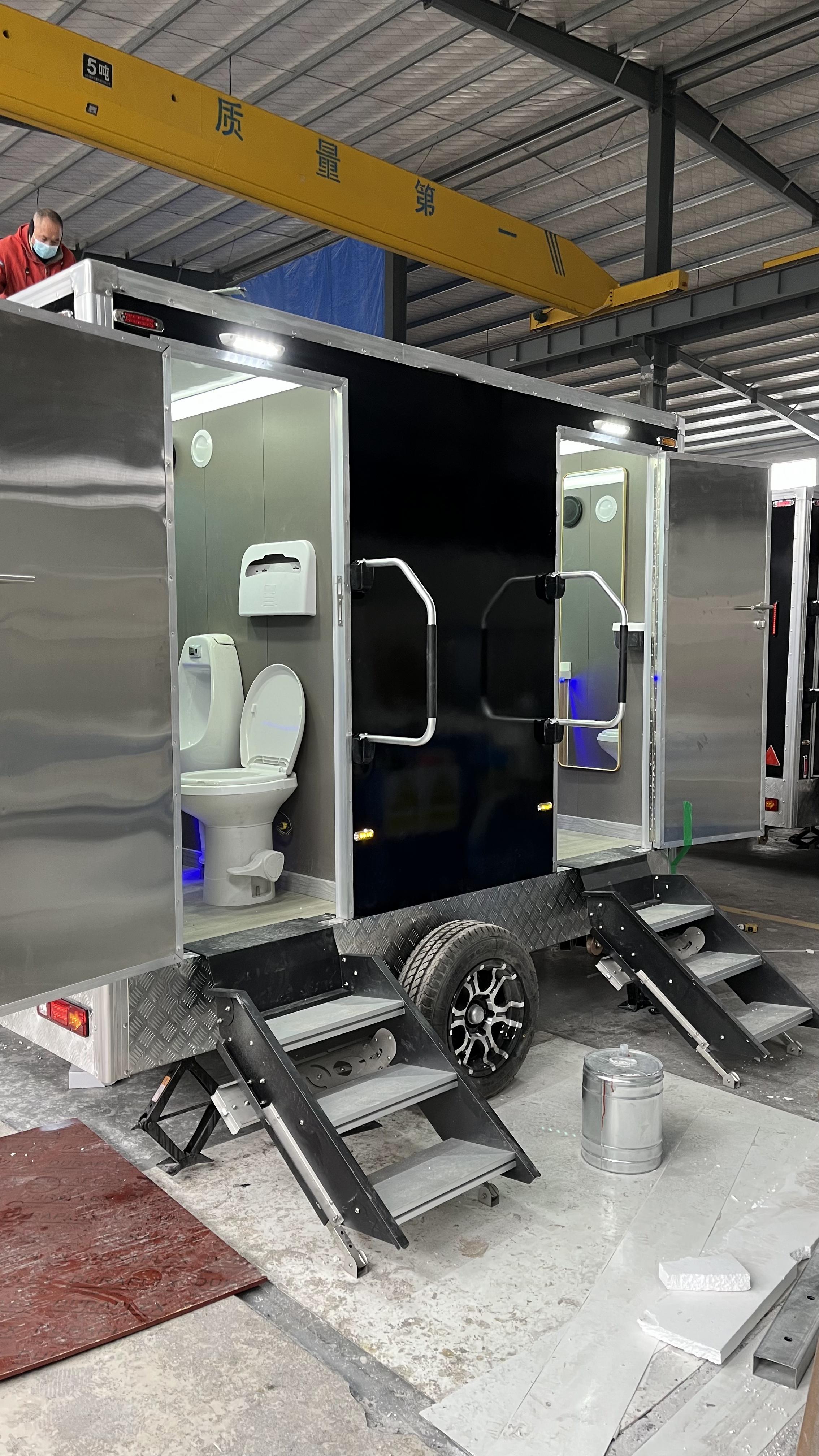 Black double/triple outdoor mobile toilets