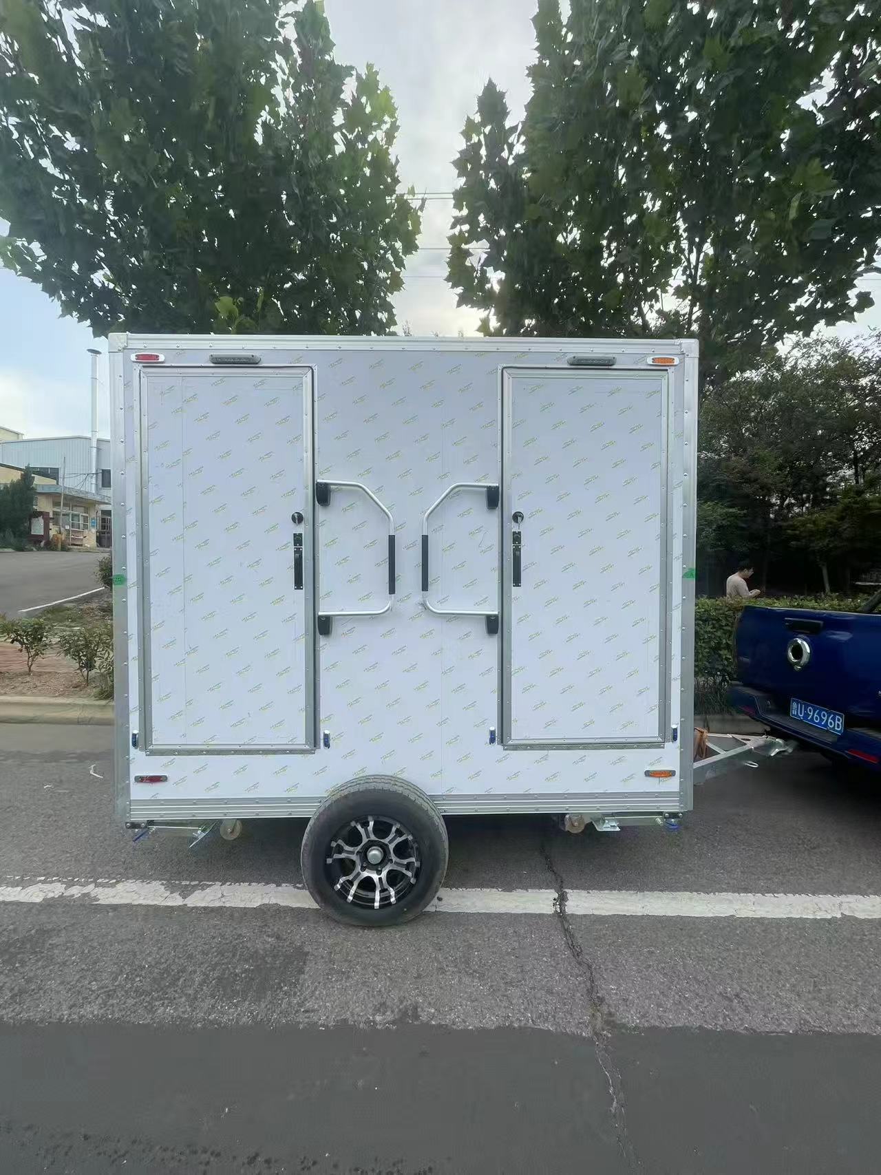 Mobile trailer-mounted toilet is a convenient outdoor toilet