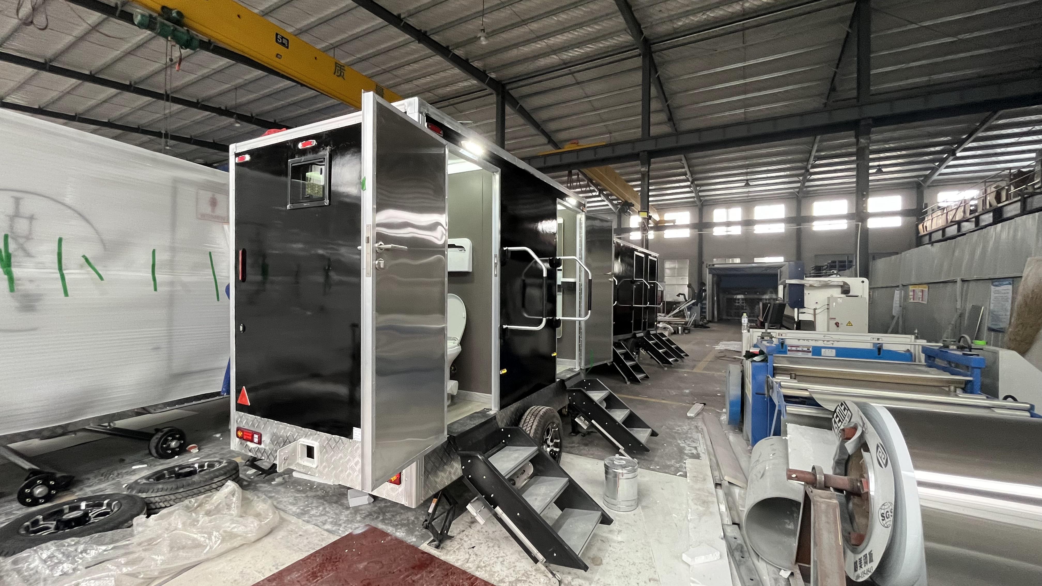 Black double/triple outdoor mobile toilets
