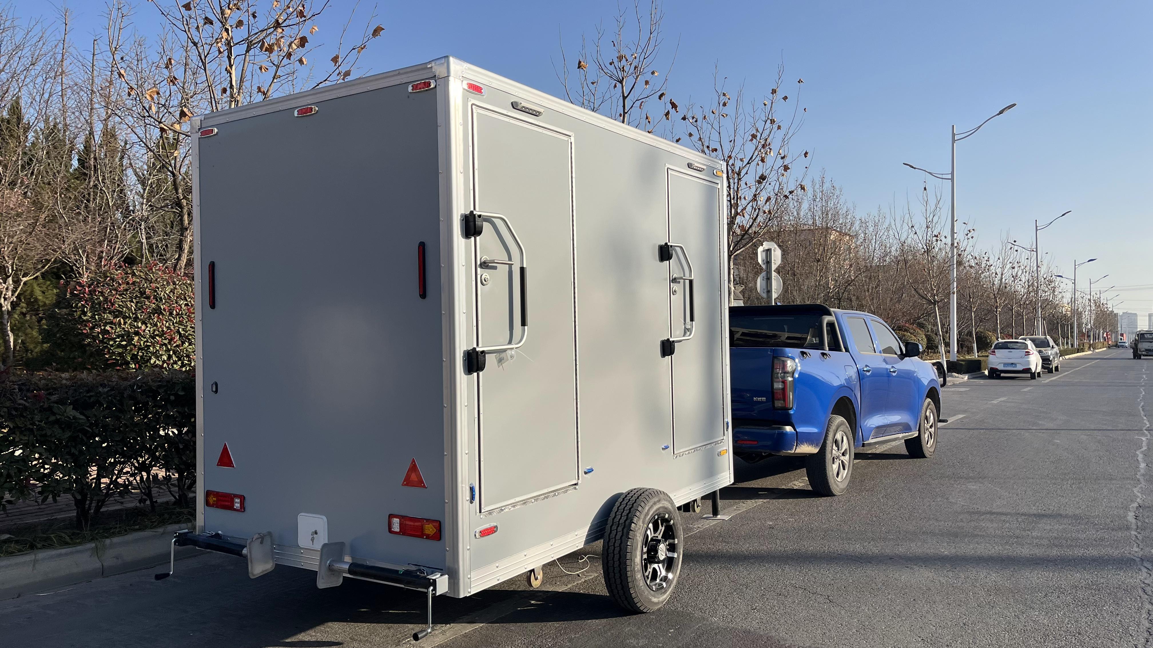 The dual-cubicle movable grey eco-friendly toilet efficiently meets temporary needs