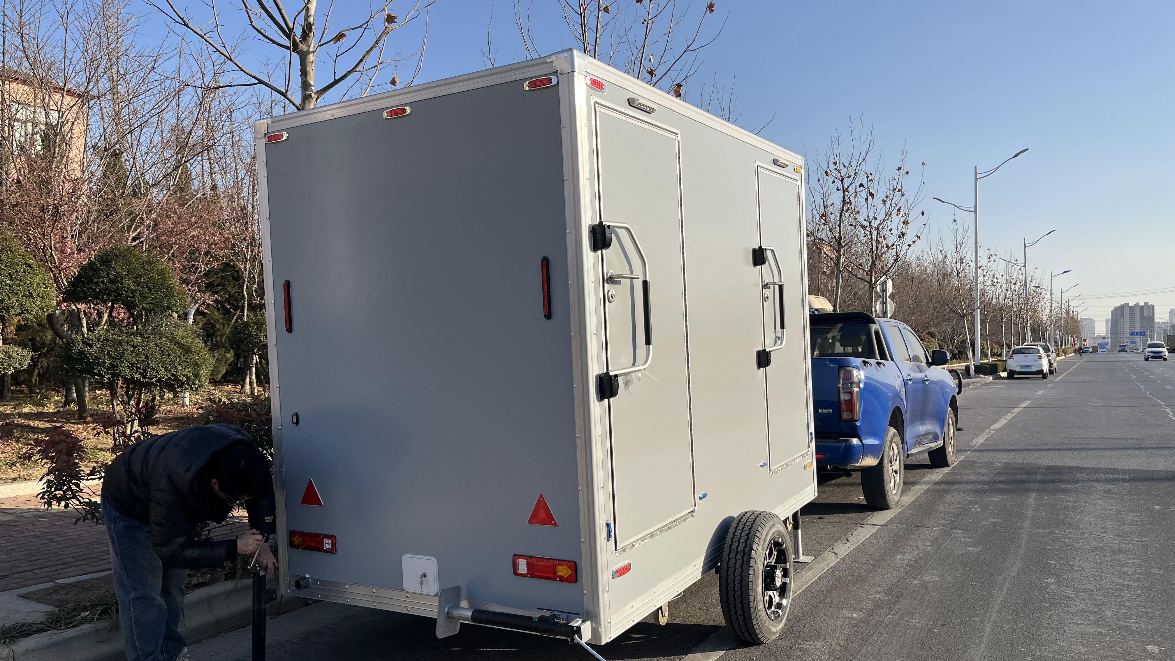 The dual-cubicle movable grey eco-friendly toilet efficiently meets temporary needs