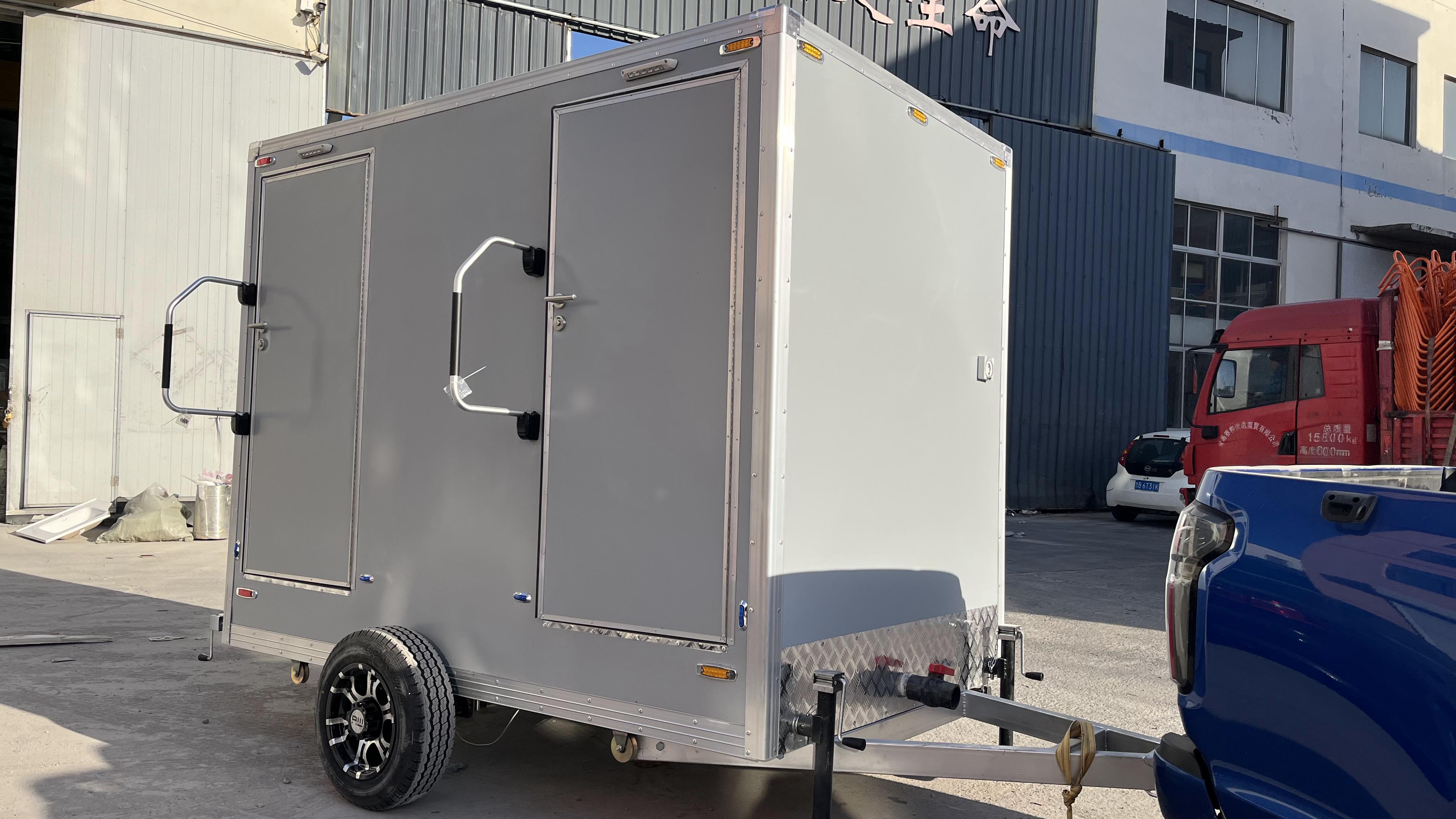 The dual-cubicle movable grey eco-friendly toilet efficiently meets temporary needs