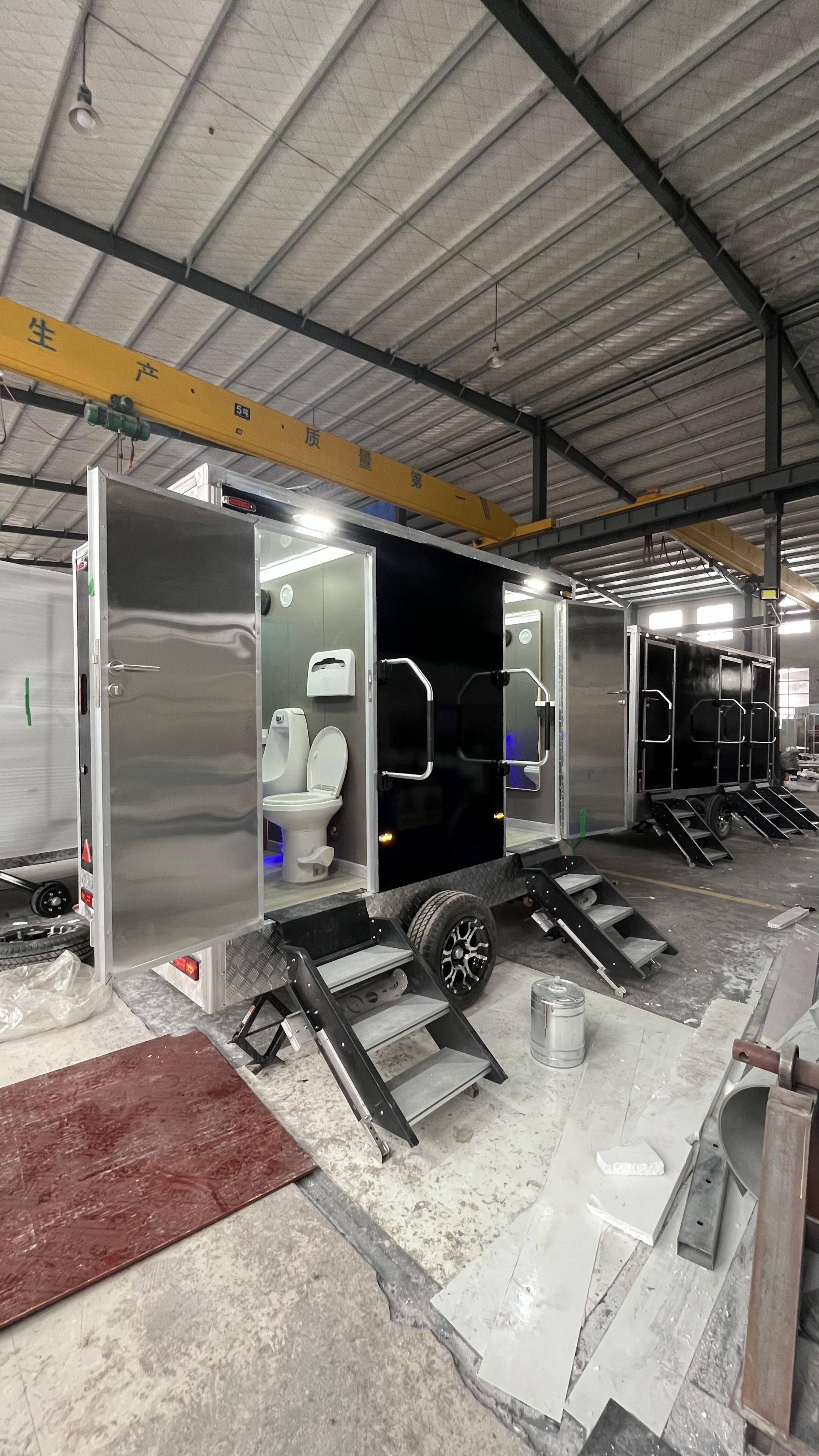 Black double/triple outdoor mobile toilets