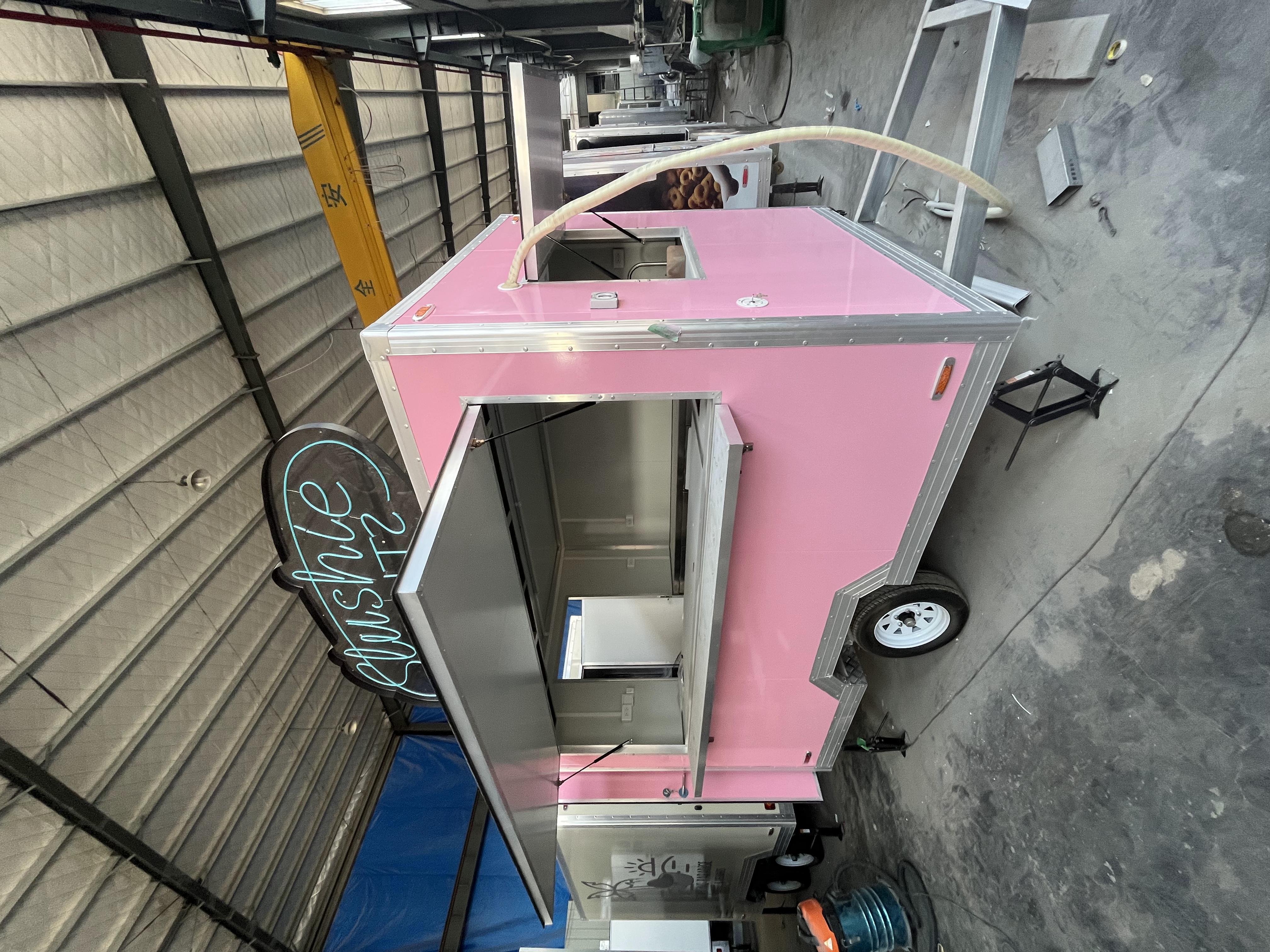 Fashionable pink "Slushie Slutz" mobile cold drink food truck