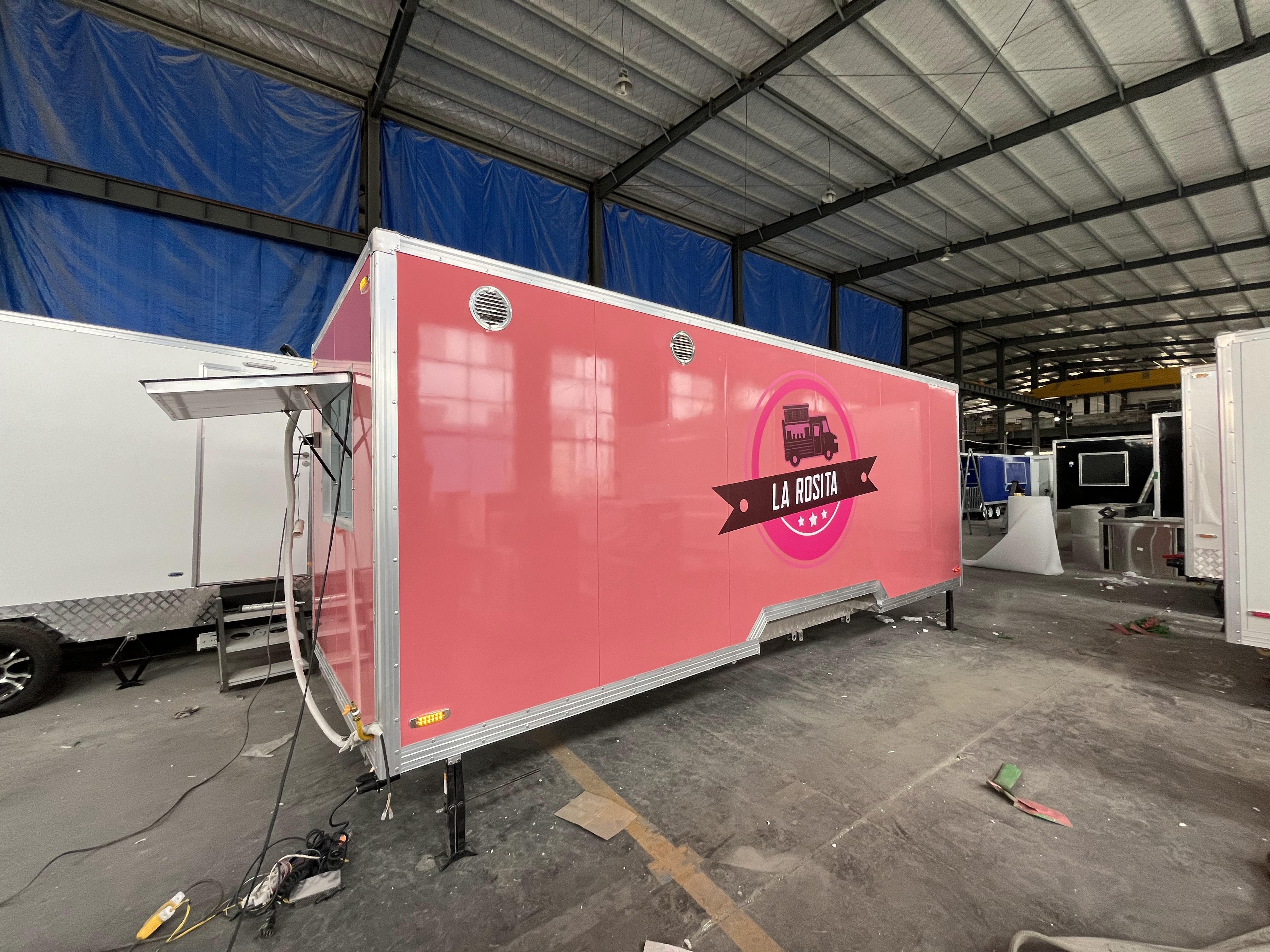 The fashionable pink mobile food truck boosts food business