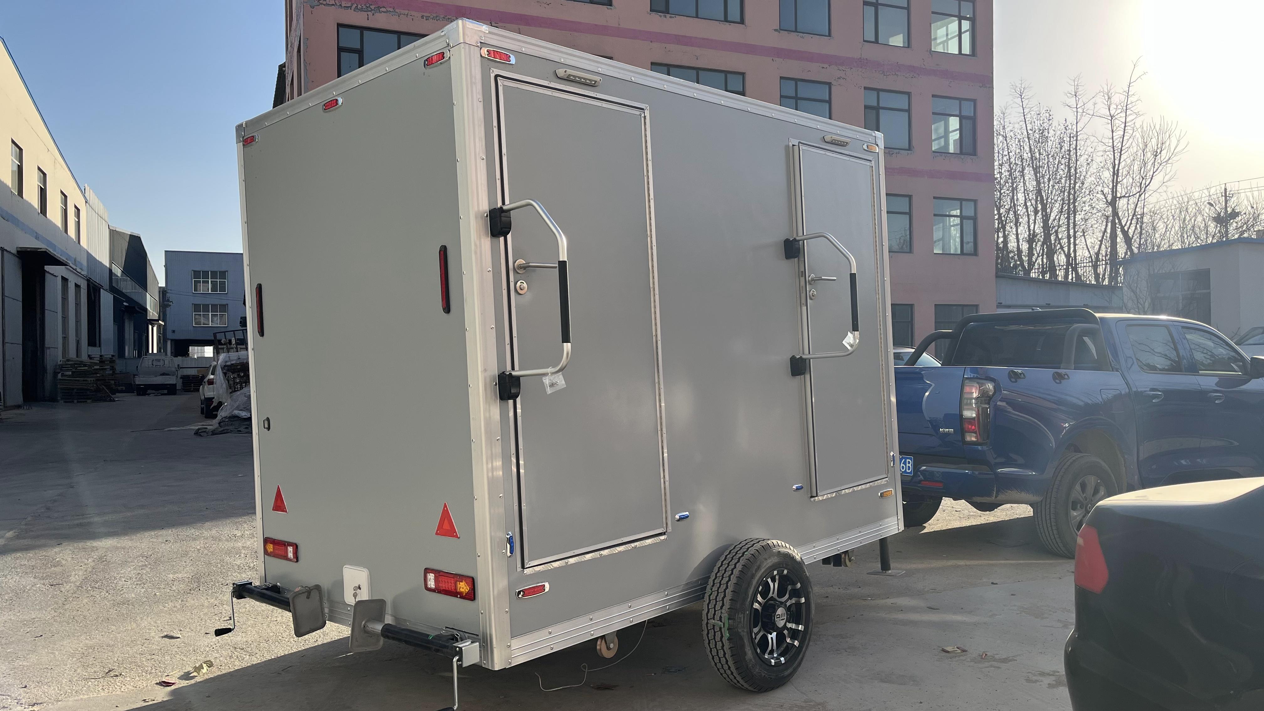 The dual-cubicle movable grey eco-friendly toilet efficiently meets temporary needs