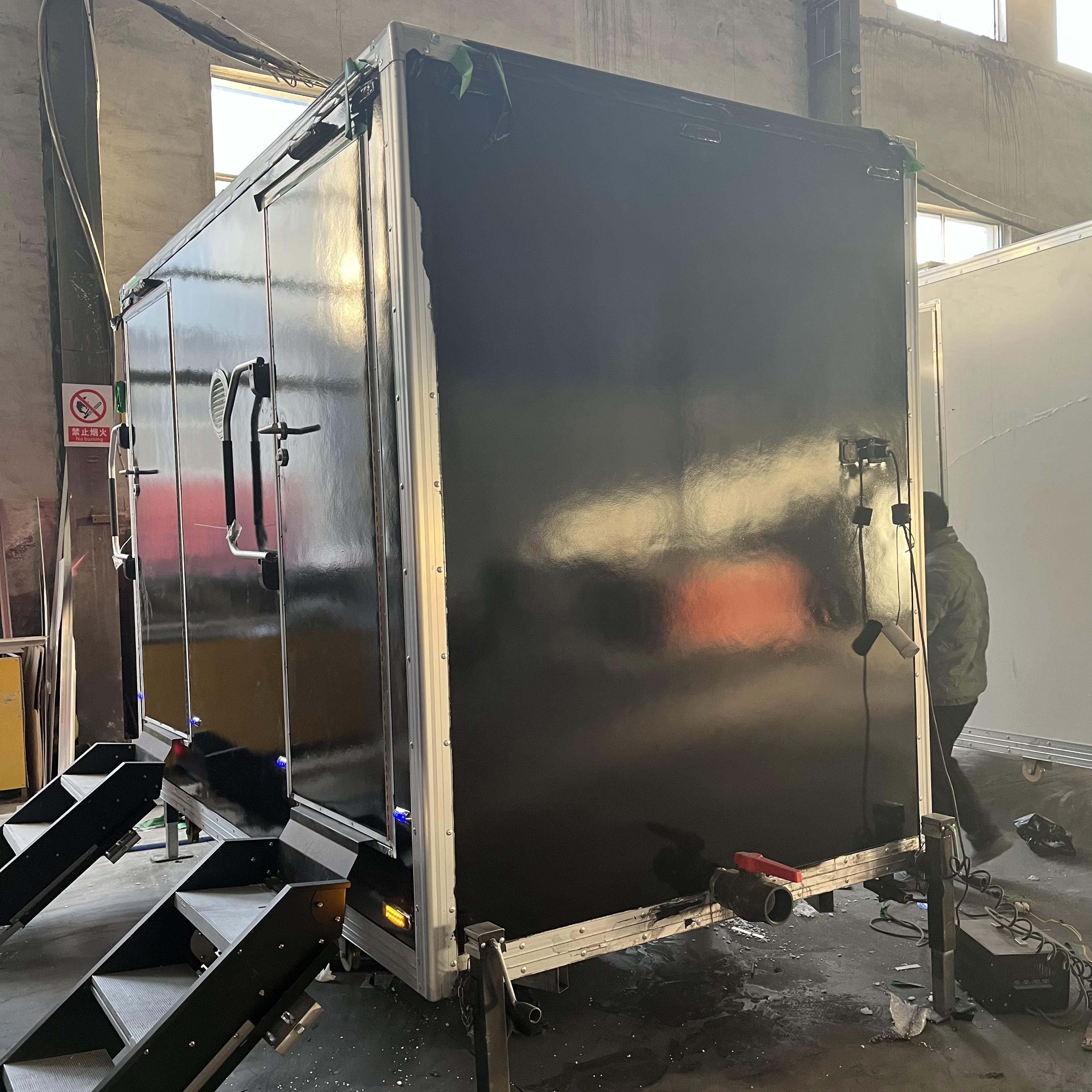 Double black mobile toilets and outdoor portable toilets