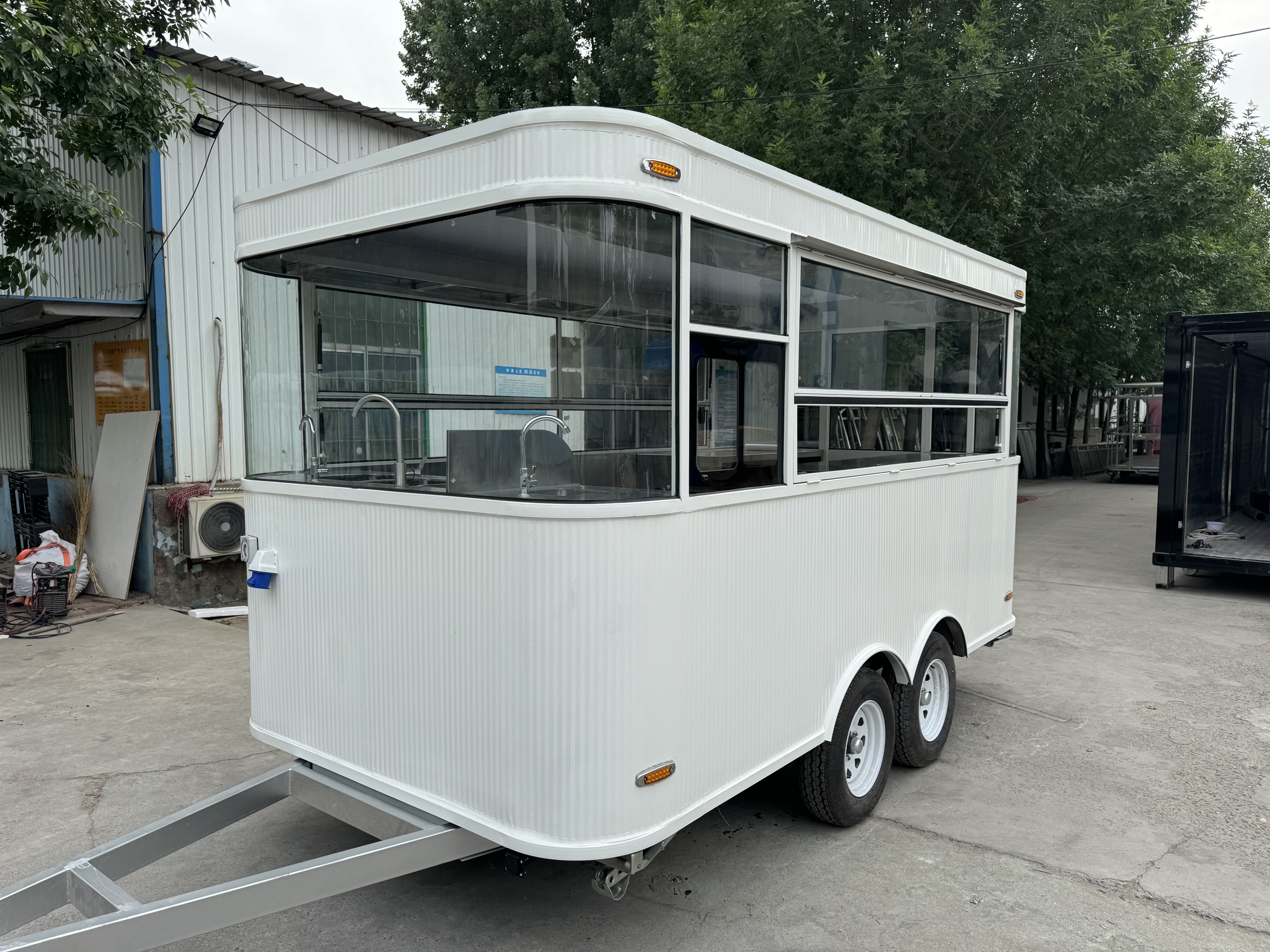 White fashionable mobile food truck, outdoor business food truck, convenient catering vehicle