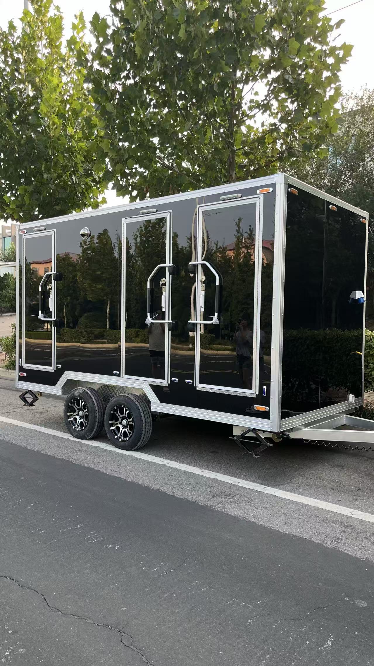 Cool and stylish black-faced dual-wheel drive mobile toilet trailer, a great helper for outdoor emergencies