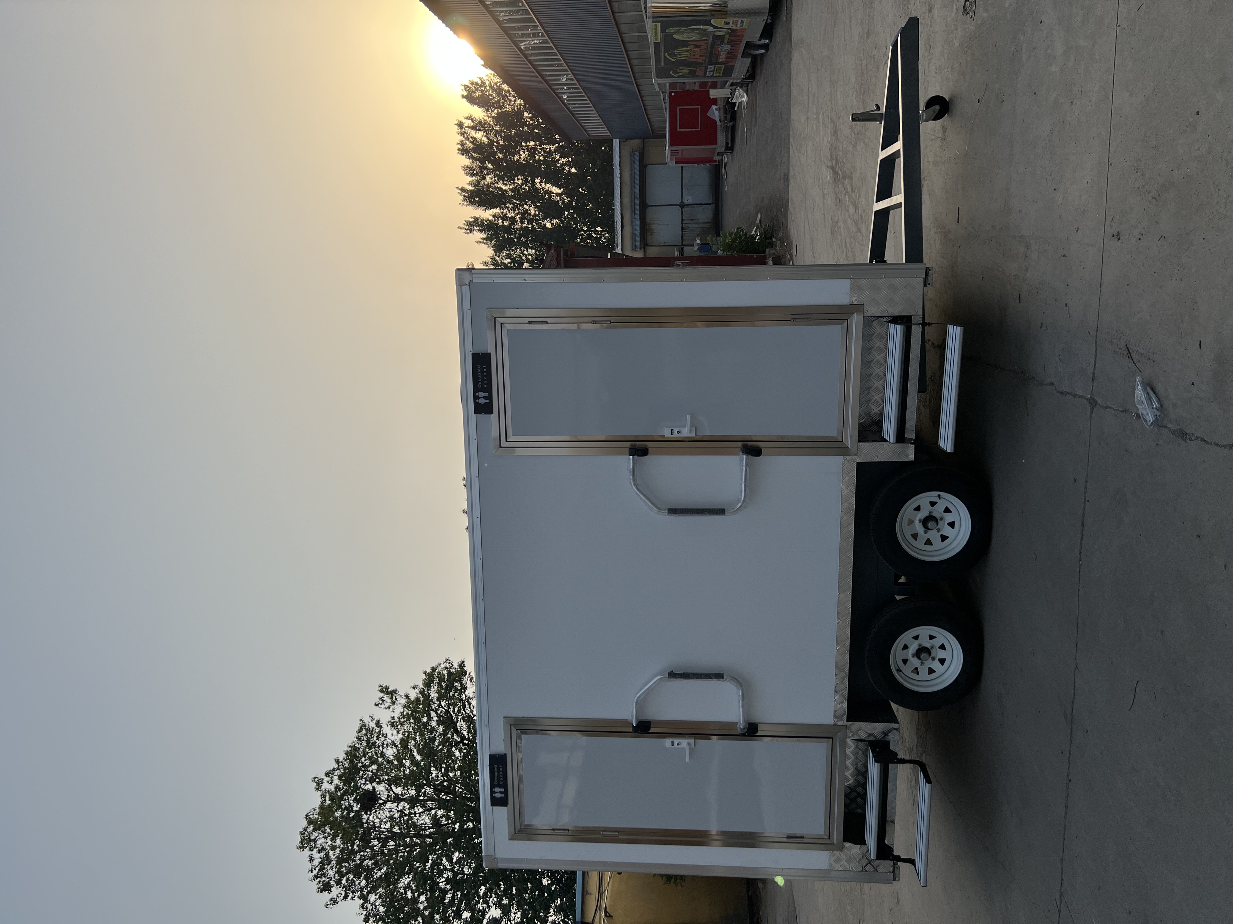 Two-wheel mobile multi-cabin toilet, outdoor emergency and convenient toilet