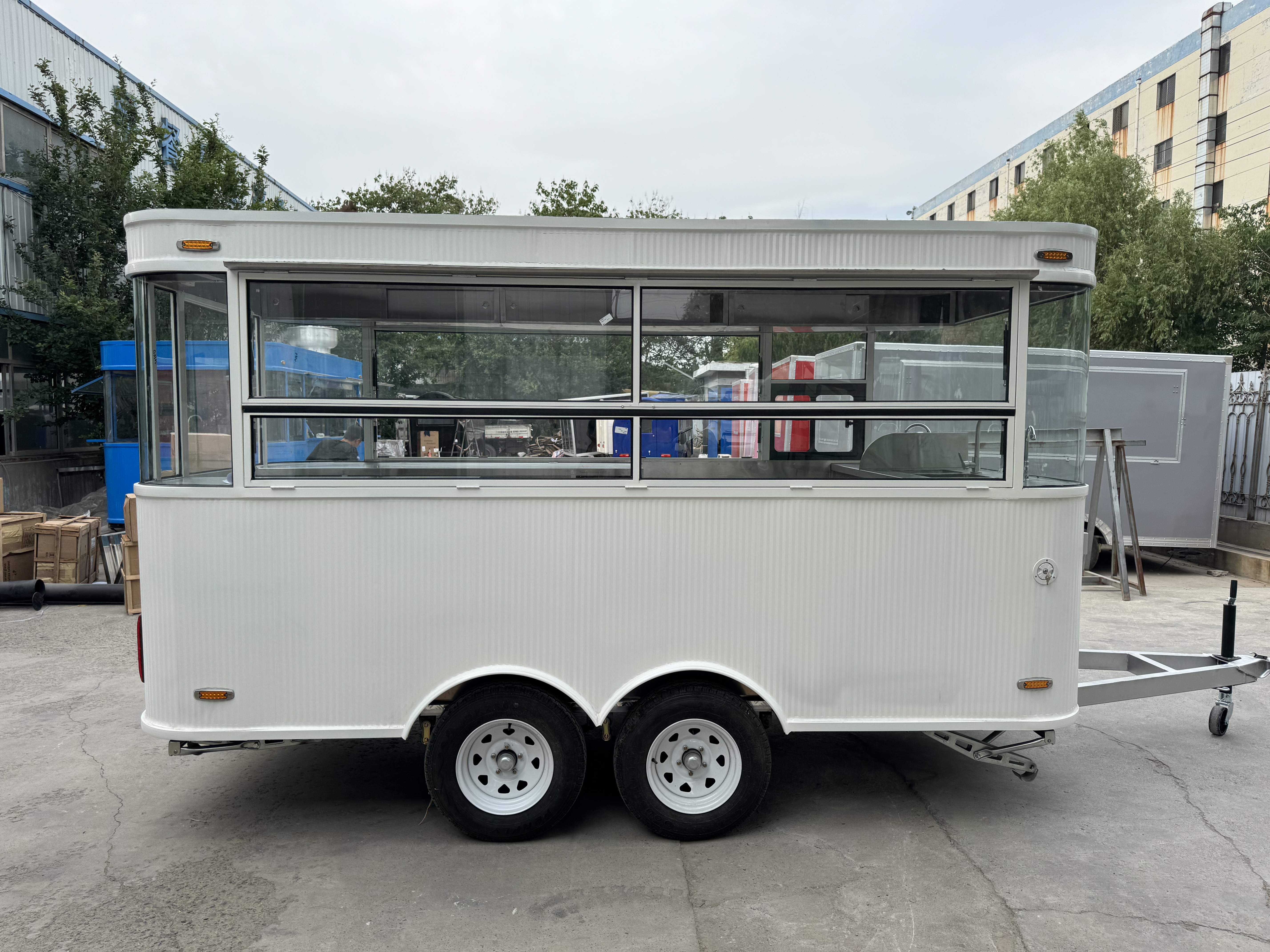 White fashionable mobile food truck, outdoor business food truck, convenient catering vehicle