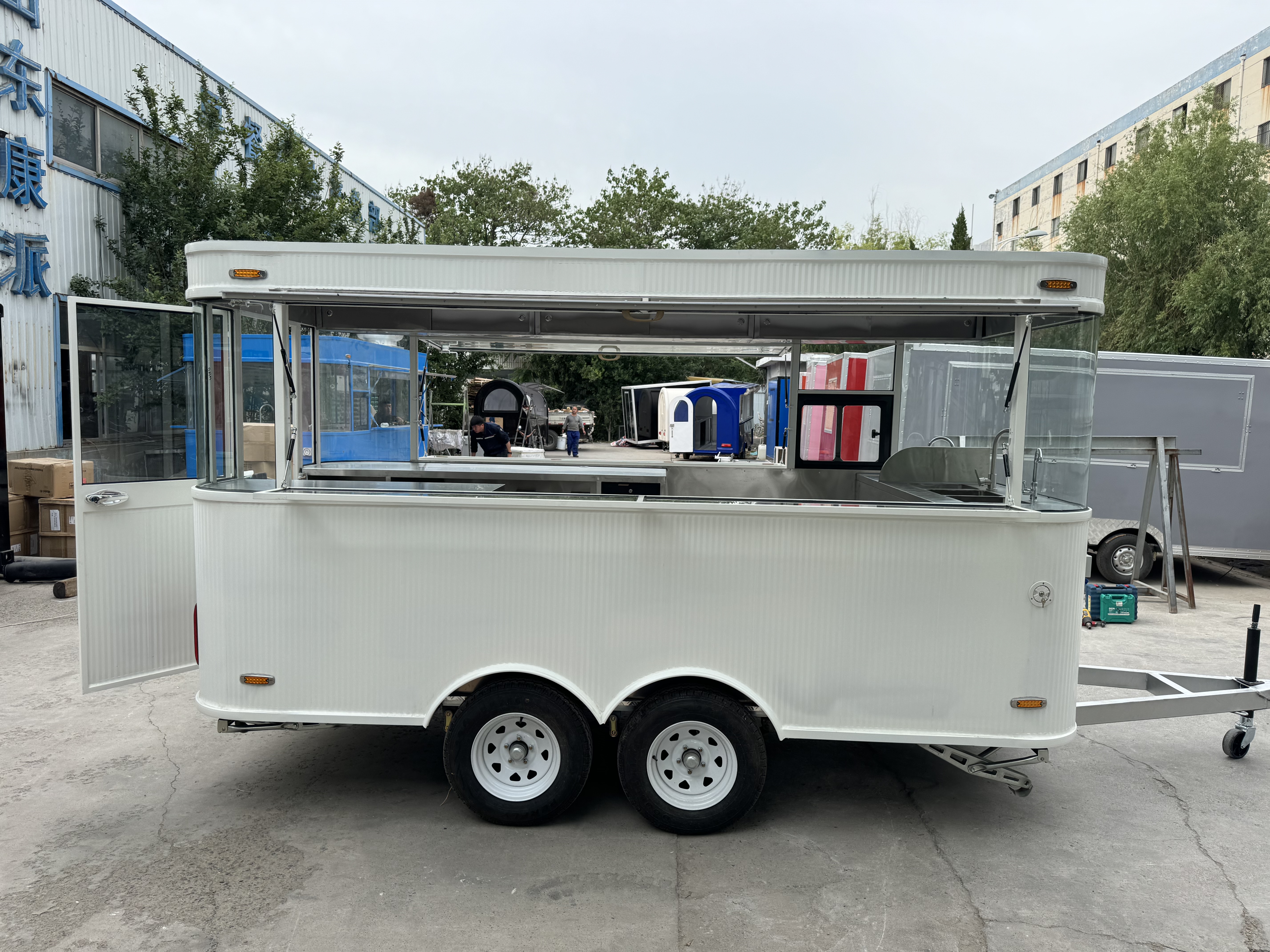 White fashionable mobile food truck, outdoor business food truck, convenient catering vehicle