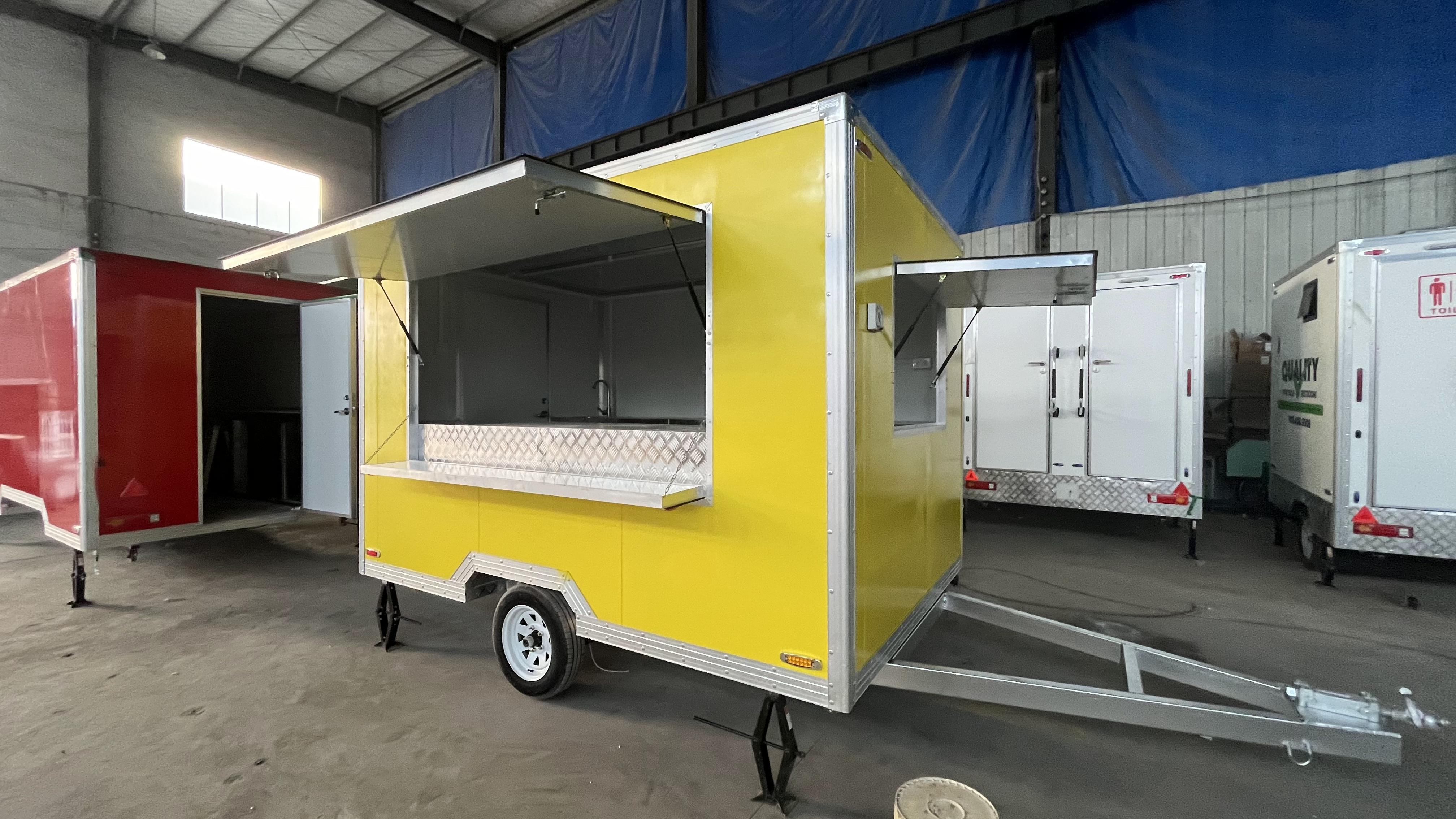 The bright yellow mobile food truck initiates a new flexible food business model