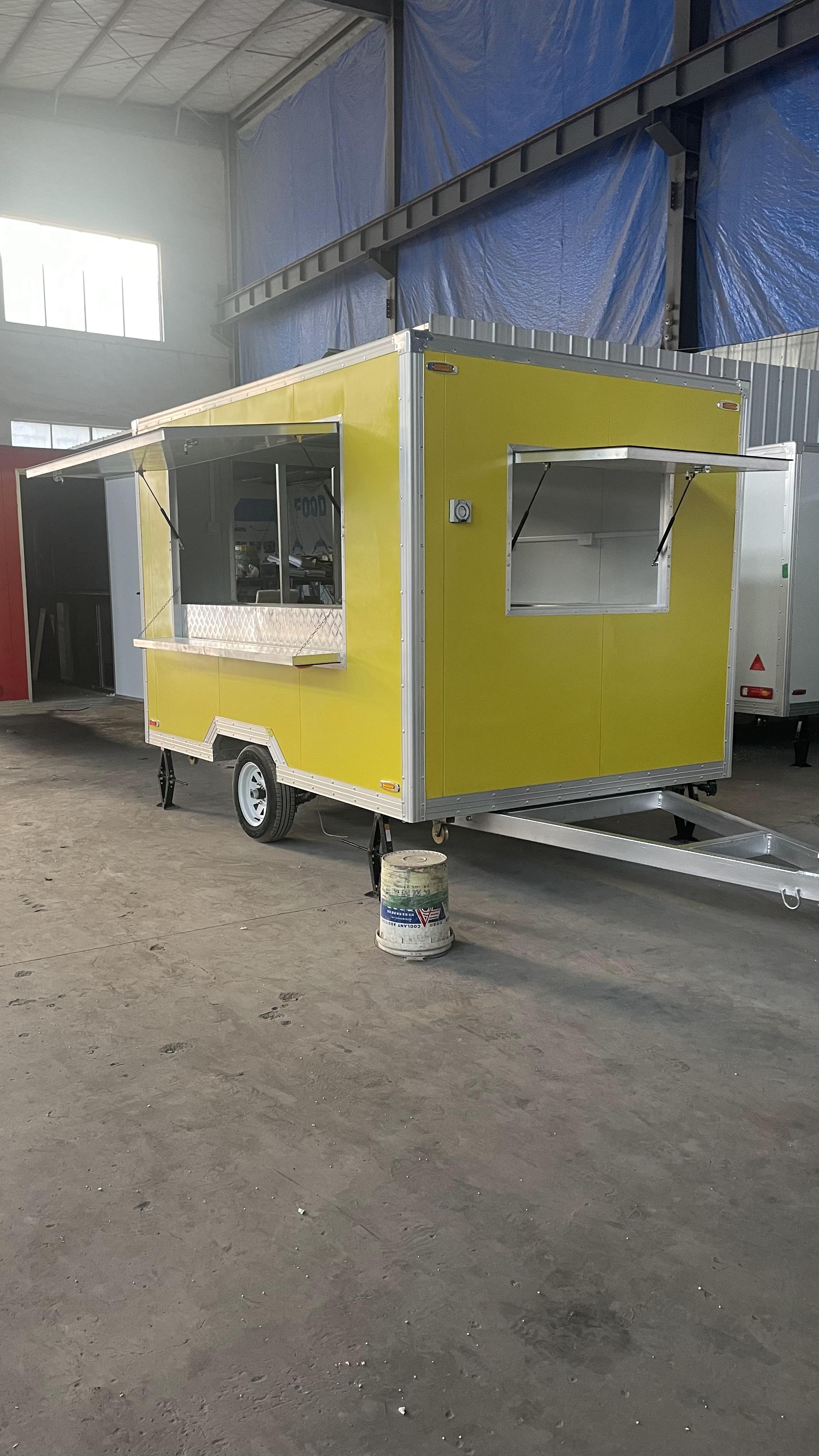 The bright yellow mobile food truck initiates a new flexible food business model
