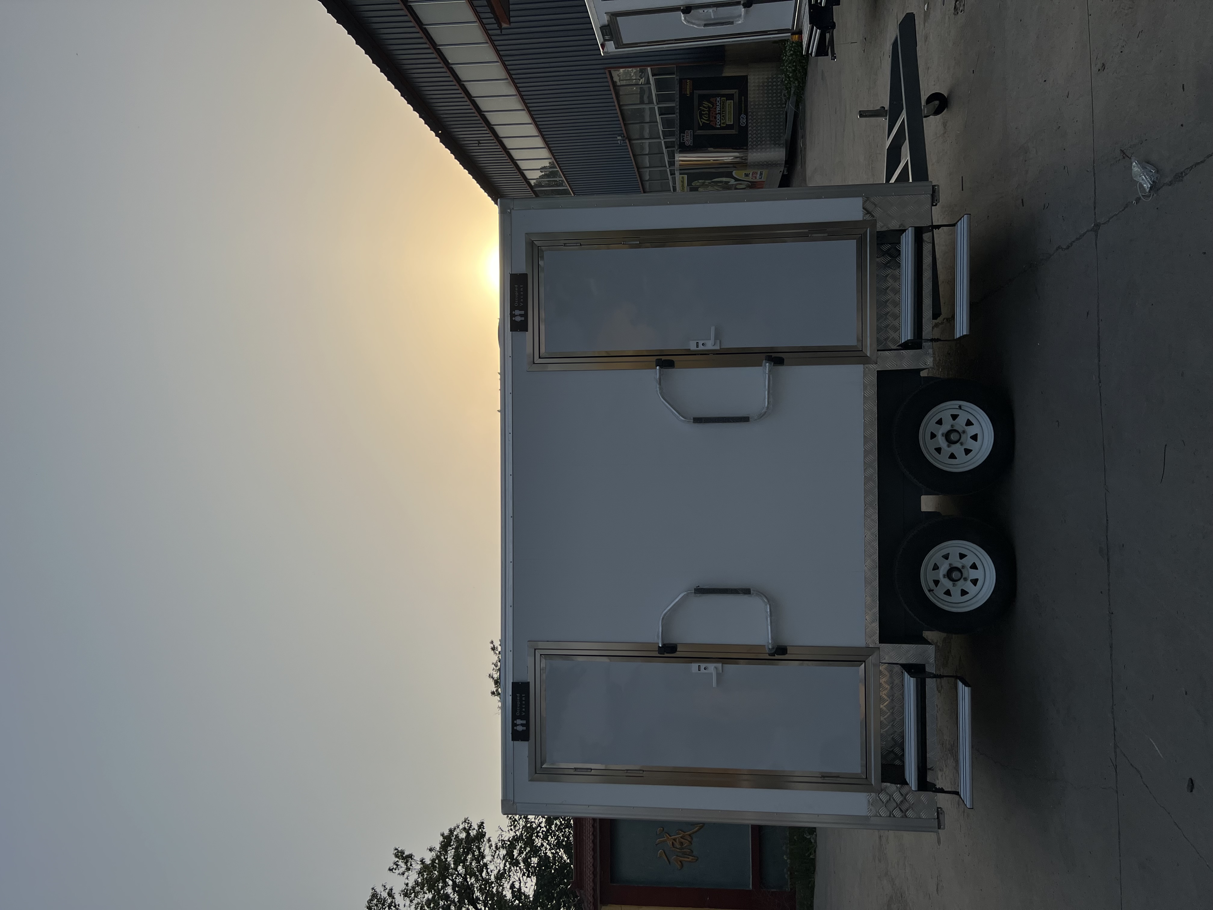 Two-wheel mobile multi-cabin toilet, outdoor emergency and convenient toilet