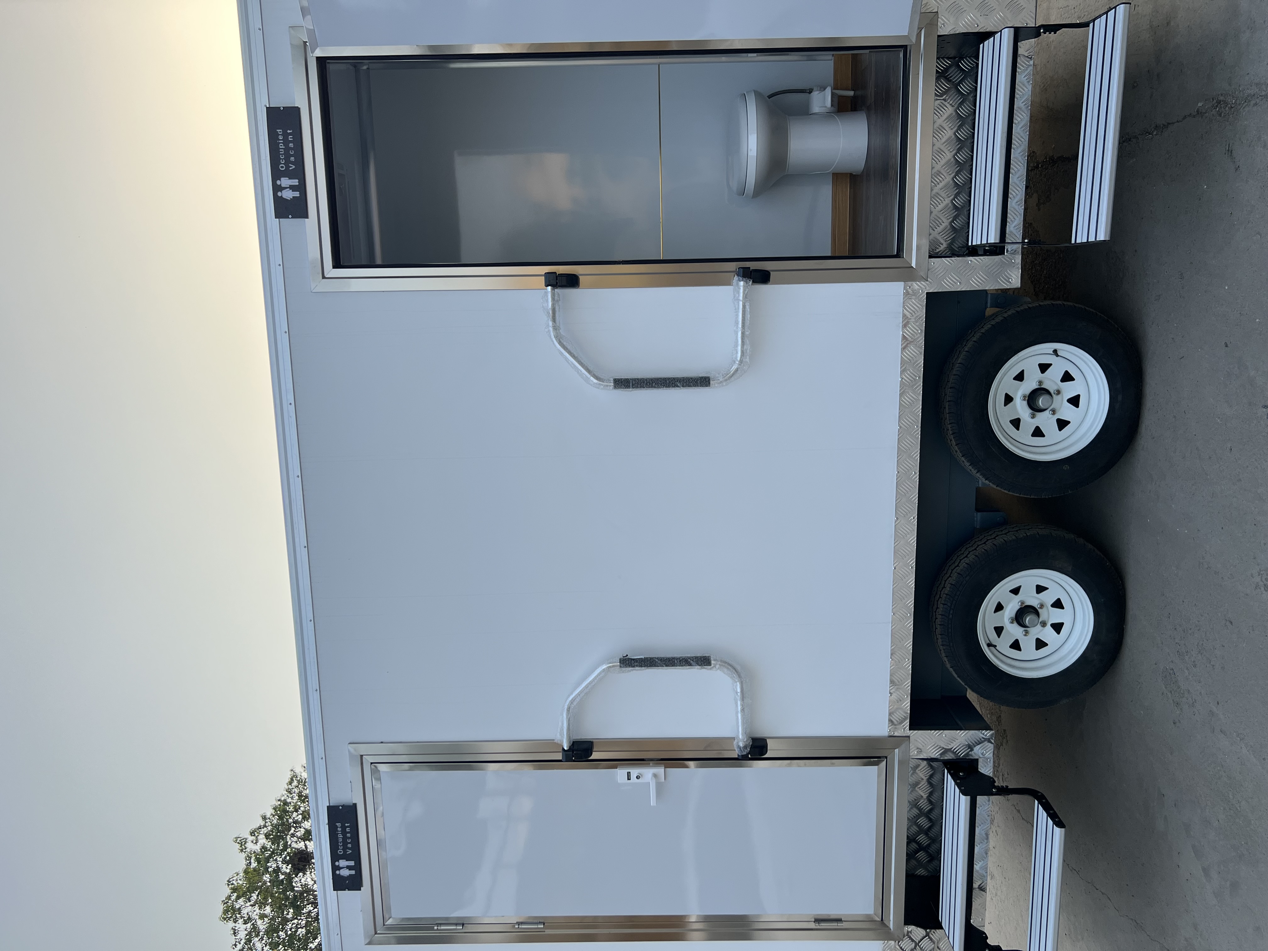 Two-wheel mobile multi-cabin toilet, outdoor emergency and convenient toilet