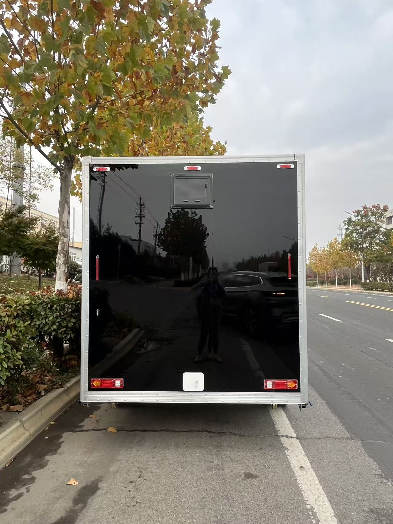 Black and gold marble-patterned outdoor portable toilet