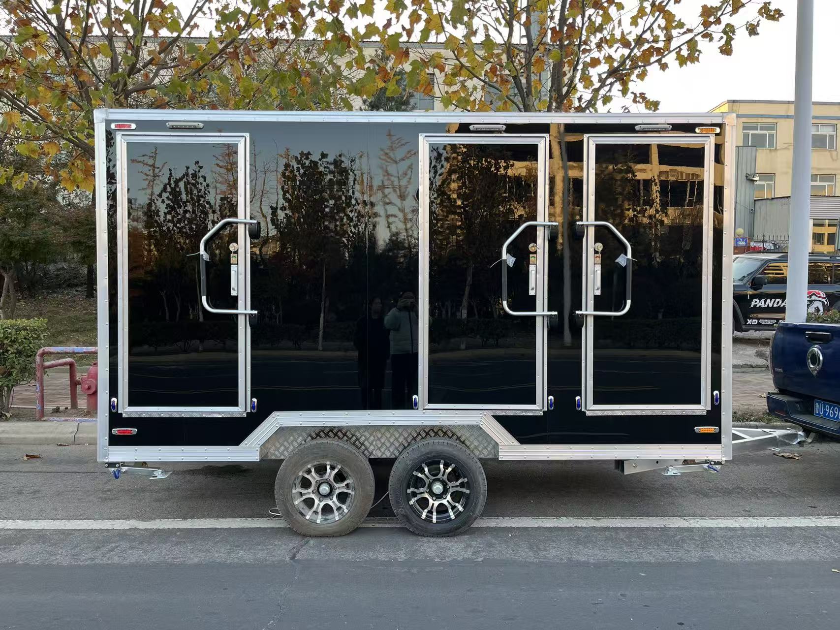 Quick-Setup Luxury Mobile Restroom | Multi-Stall Portable Toilet Trailer (Black Marble Design)