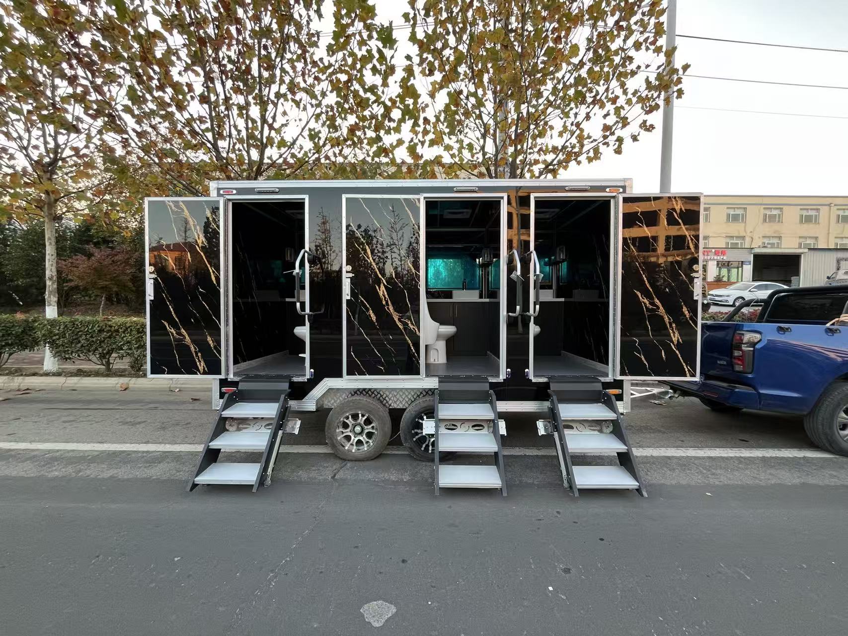 Quick-Setup Luxury Mobile Restroom | Multi-Stall Portable Toilet Trailer (Black Marble Design)