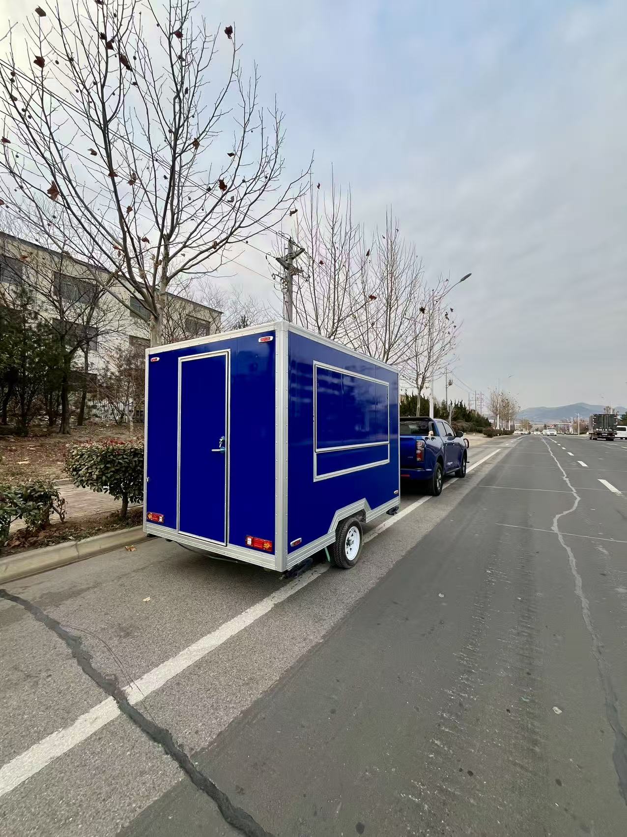 Vibrant Blue Compact Mobile Food Trailer – Portable Street Food Cart for Small Business