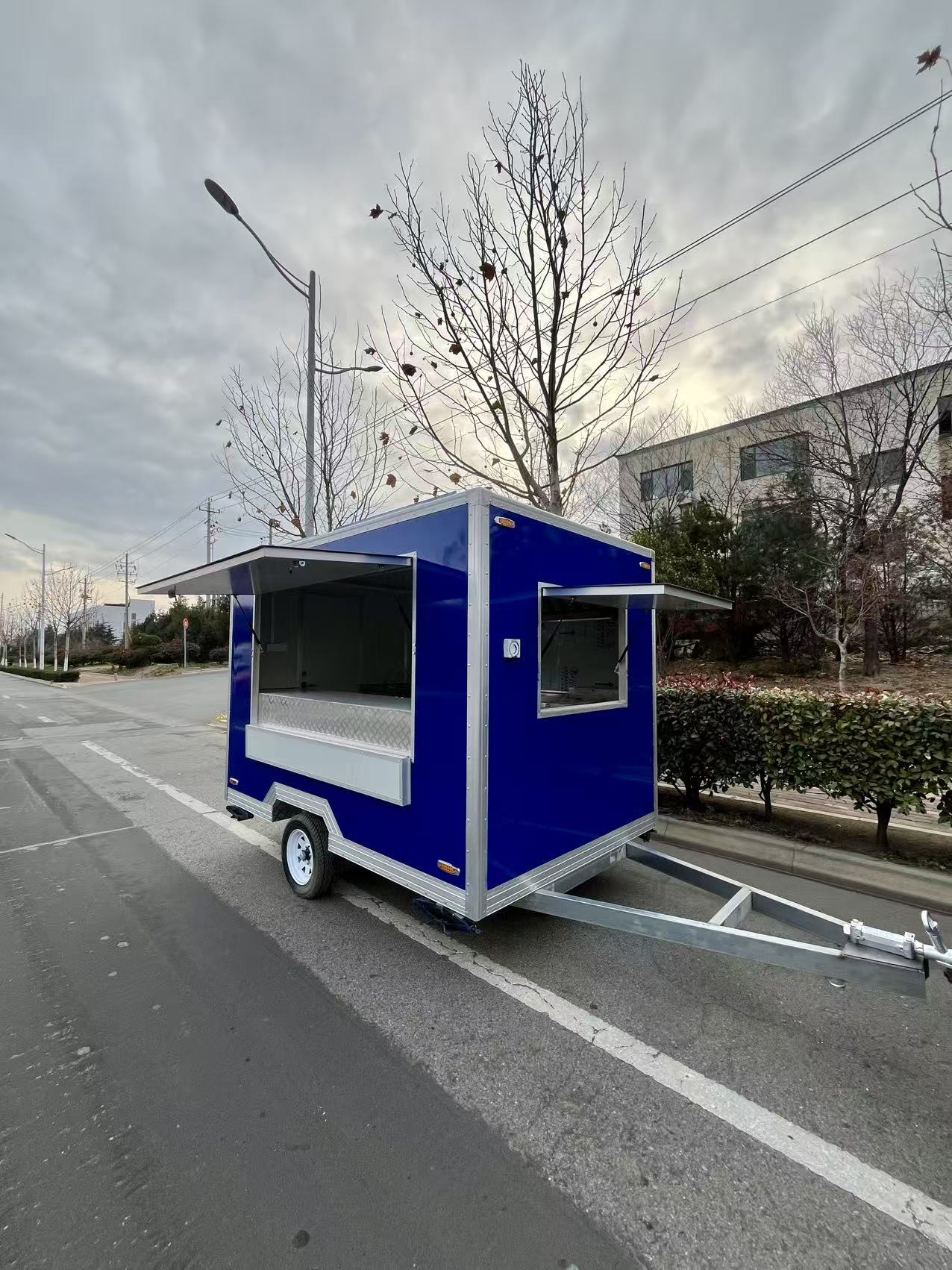Vibrant Blue Compact Mobile Food Trailer – Portable Street Food Cart for Small Business