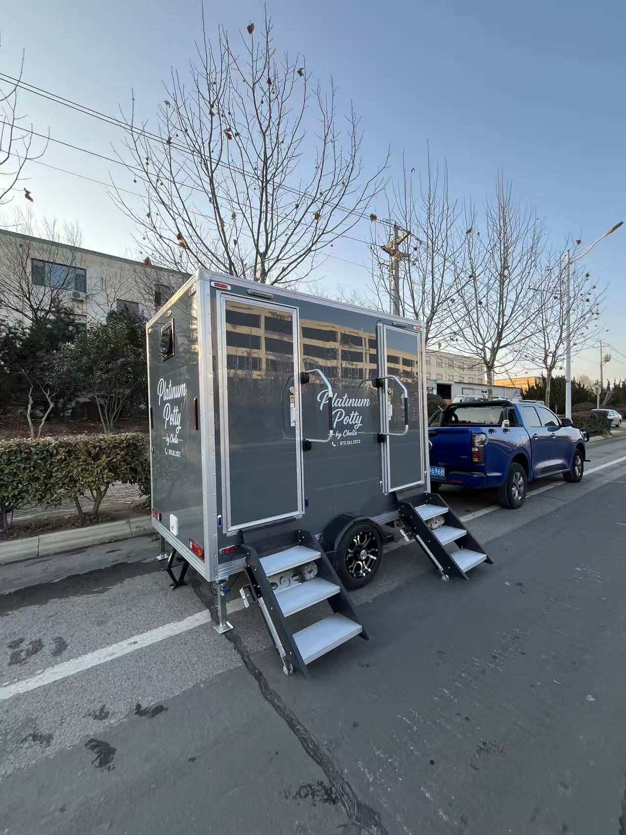 Grey high-end mobile toilet trailer: towed portable activity/camping public toilet equipment