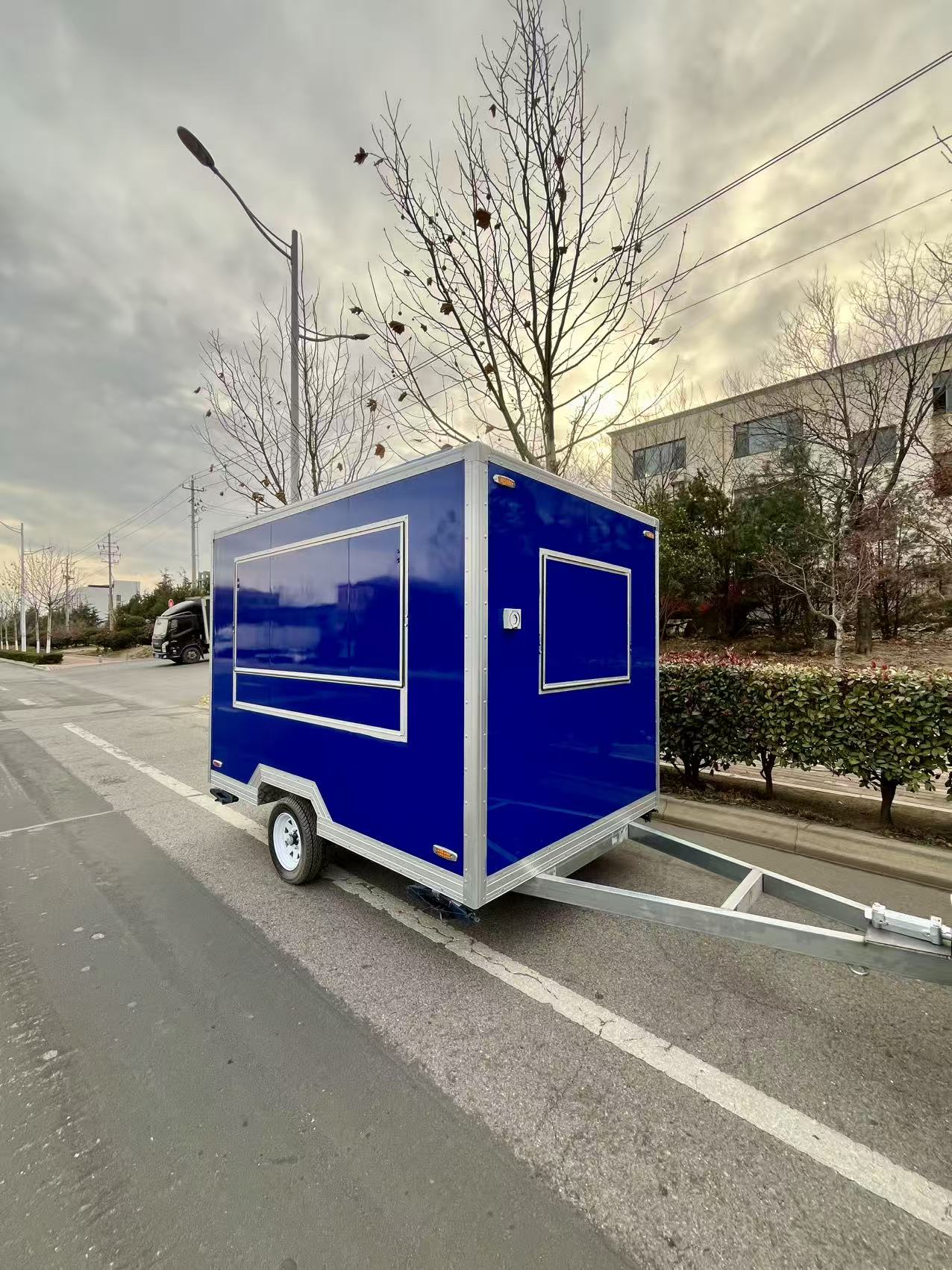 Vibrant Blue Compact Mobile Food Trailer – Portable Street Food Cart for Small Business