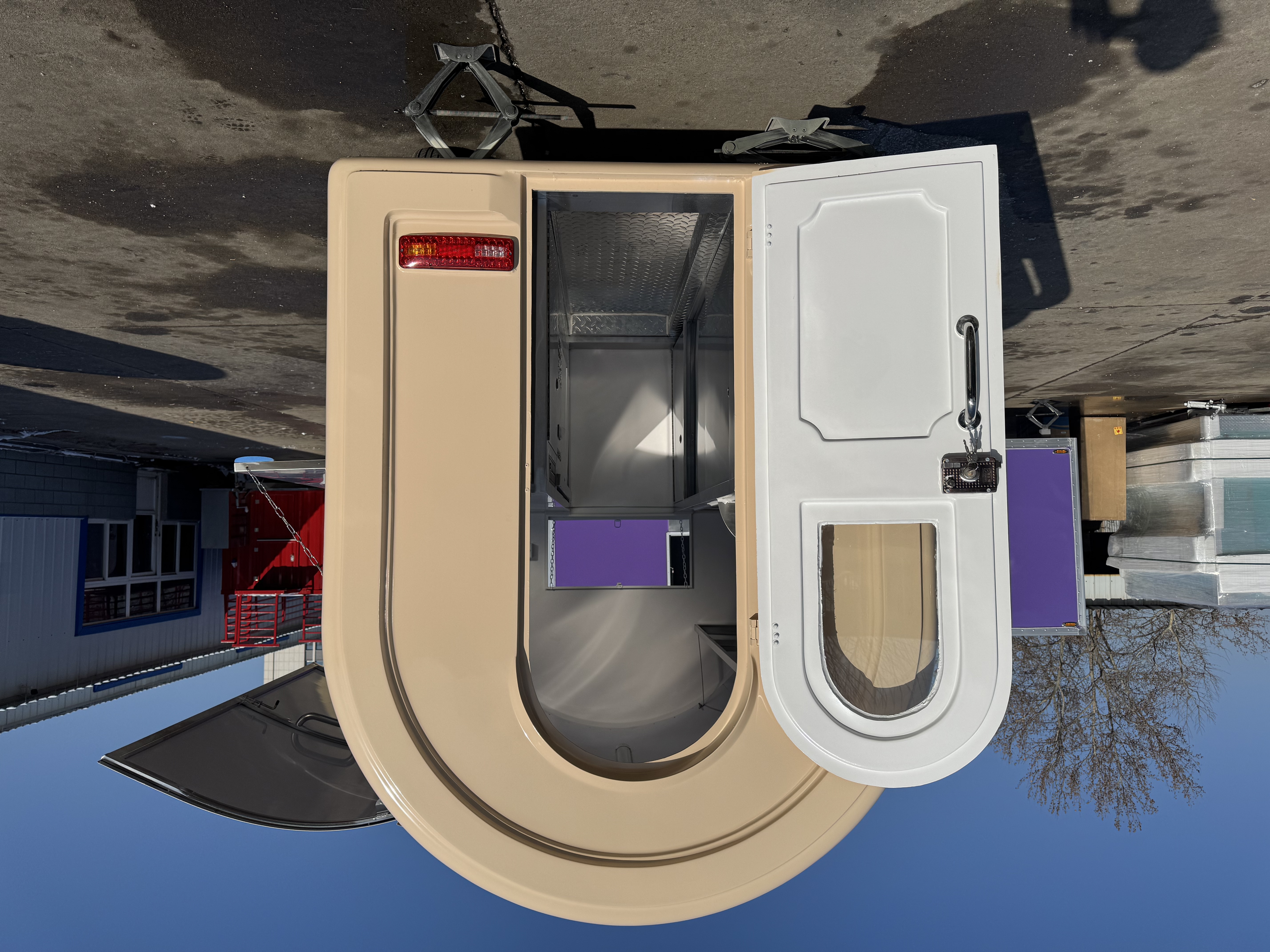 Cream-colored arc-shaped mobile food truck - a multi-functional mobile food truck for popular street food stalls