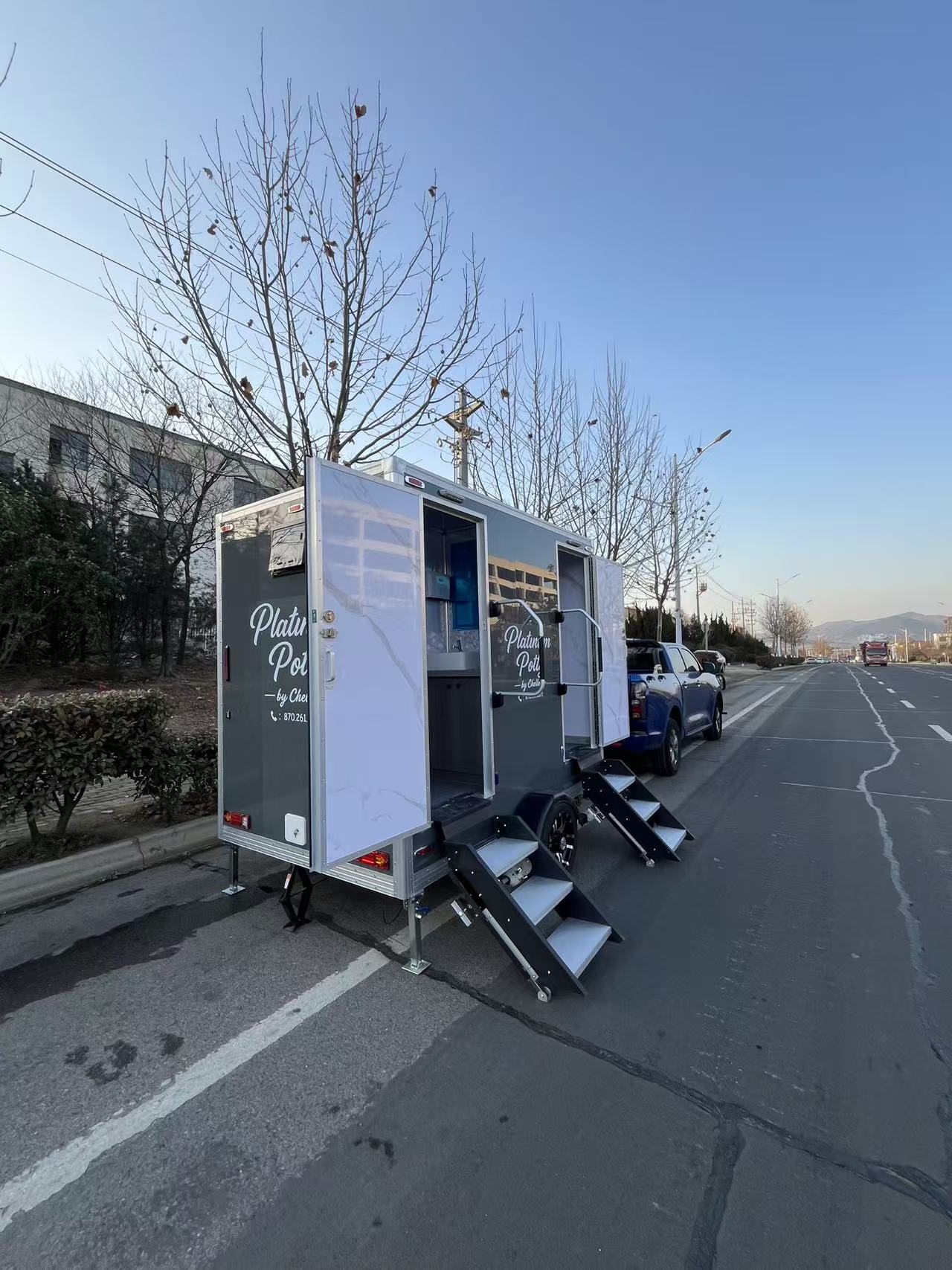 Grey high-end mobile toilet trailer: towed portable activity/camping public toilet equipment