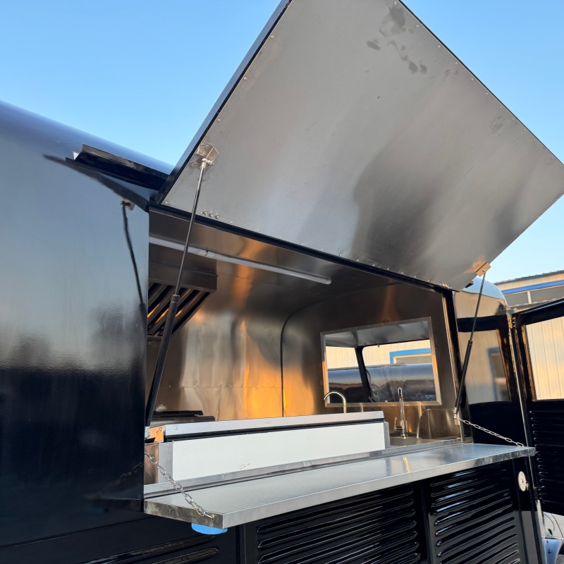 Retro-style black mobile food truck: A must-have for setting up stalls at popular markets and music festivals