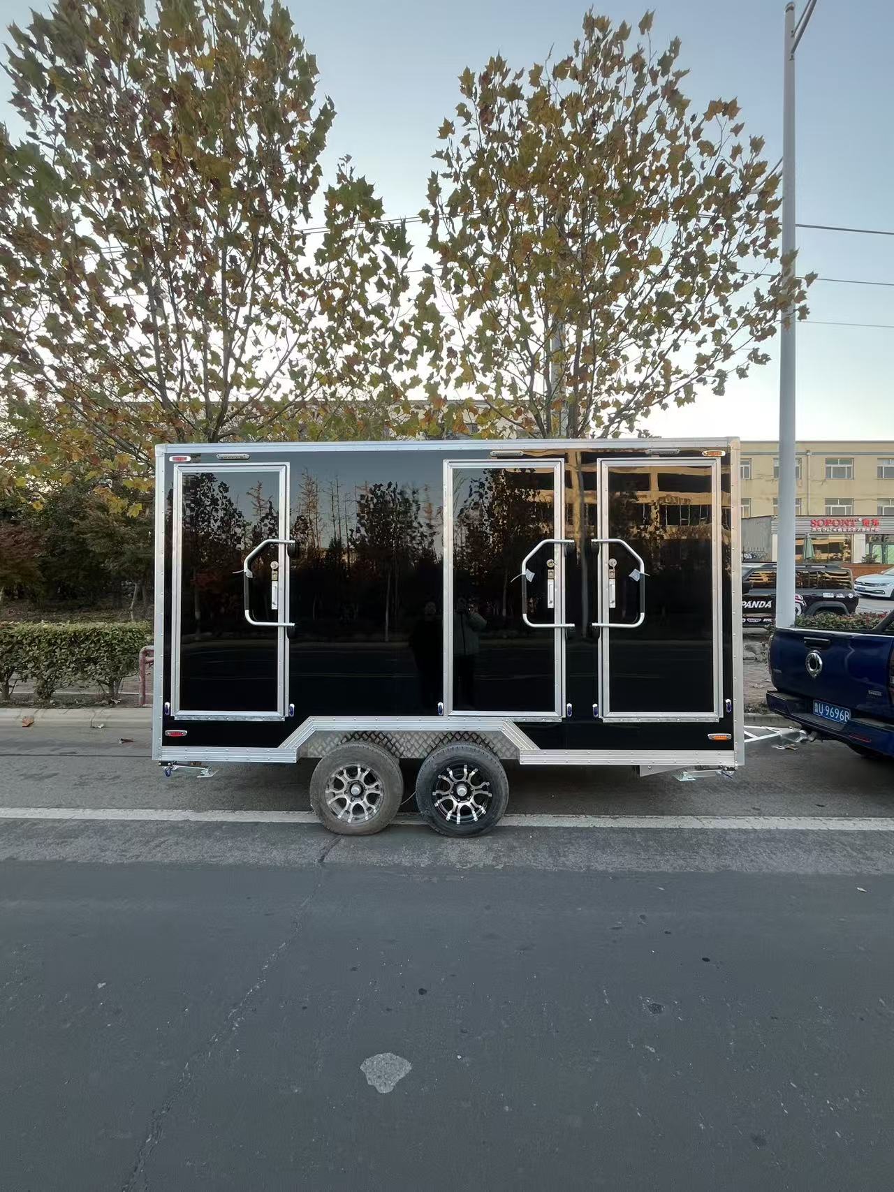 Quick-Setup Luxury Mobile Restroom | Multi-Stall Portable Toilet Trailer (Black Marble Design)